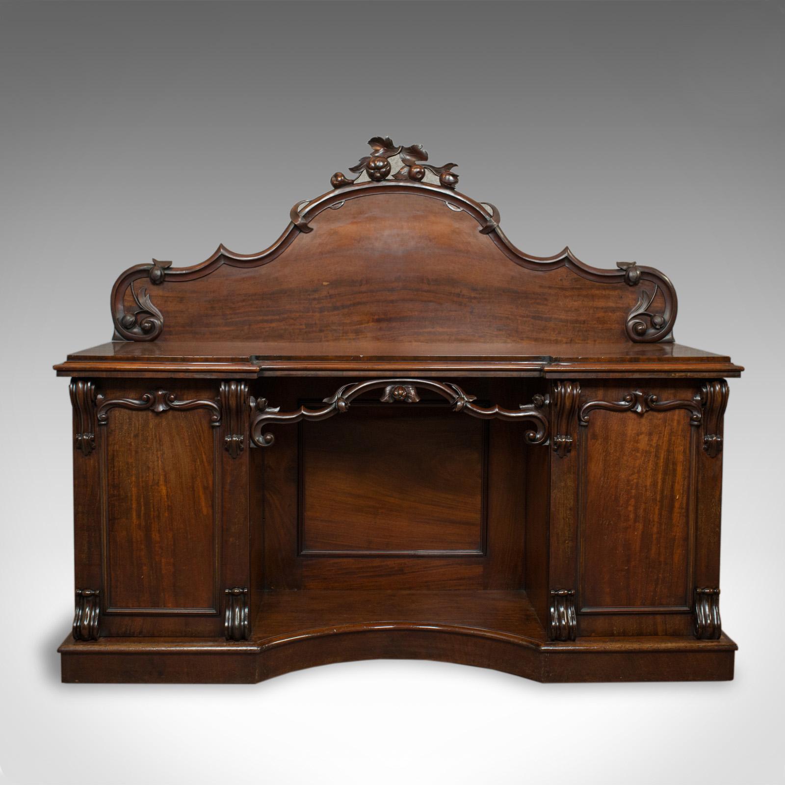 This is a large antique sideboard. An English, Victorian mahogany dresser dating to the mid-19th century, circa 1850.

Resplendent in rich mahogany with fine grain interest
Good consistent color throughout and a desirable aged patina
Deep russet