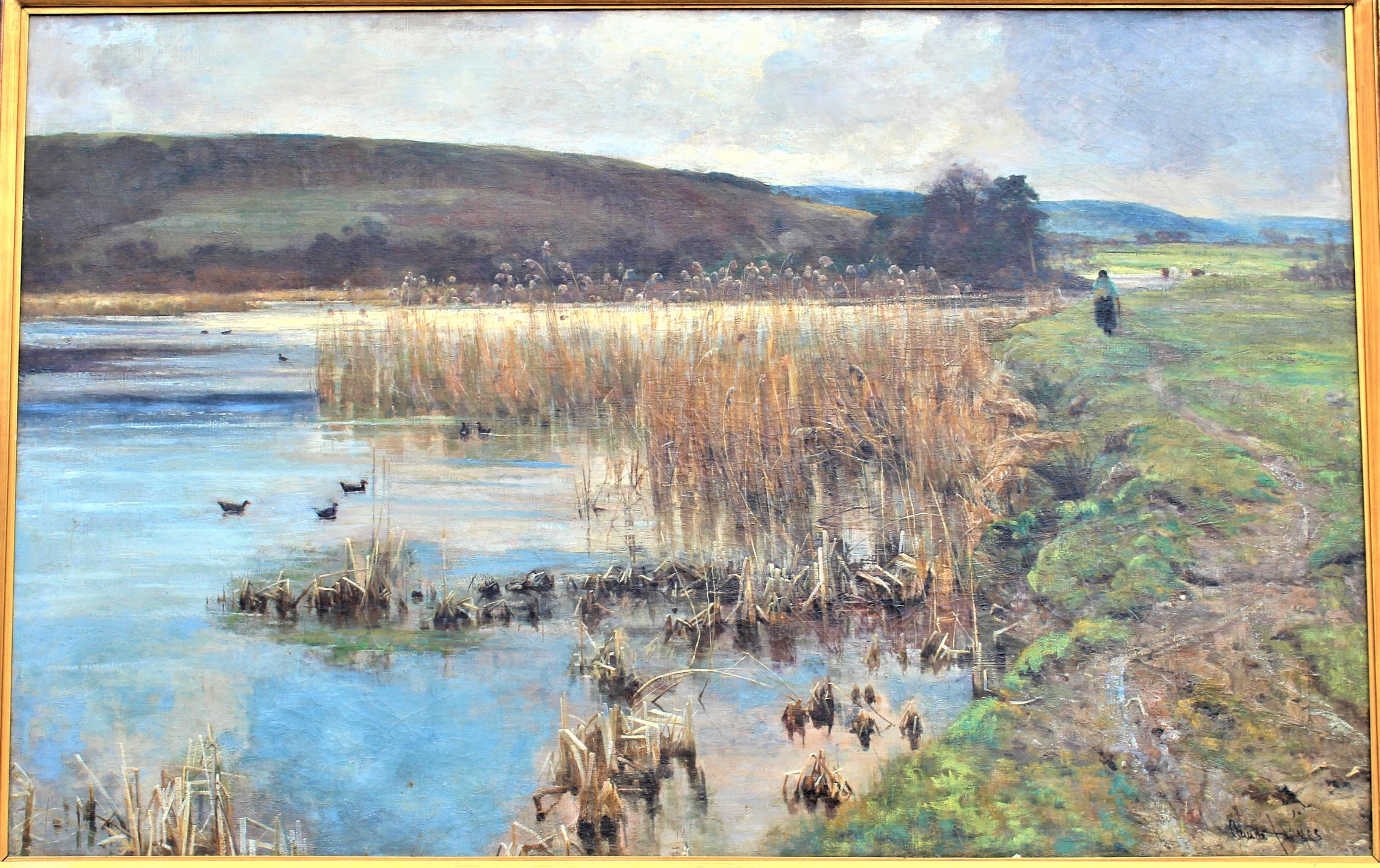 Done in England in the middle of the Victorian Period, this very substantial original oil painting on canvas is done by noted British artist Claude Hayes. The painting depicts a marsh scene in the foreground with a woman walking along a pathway of