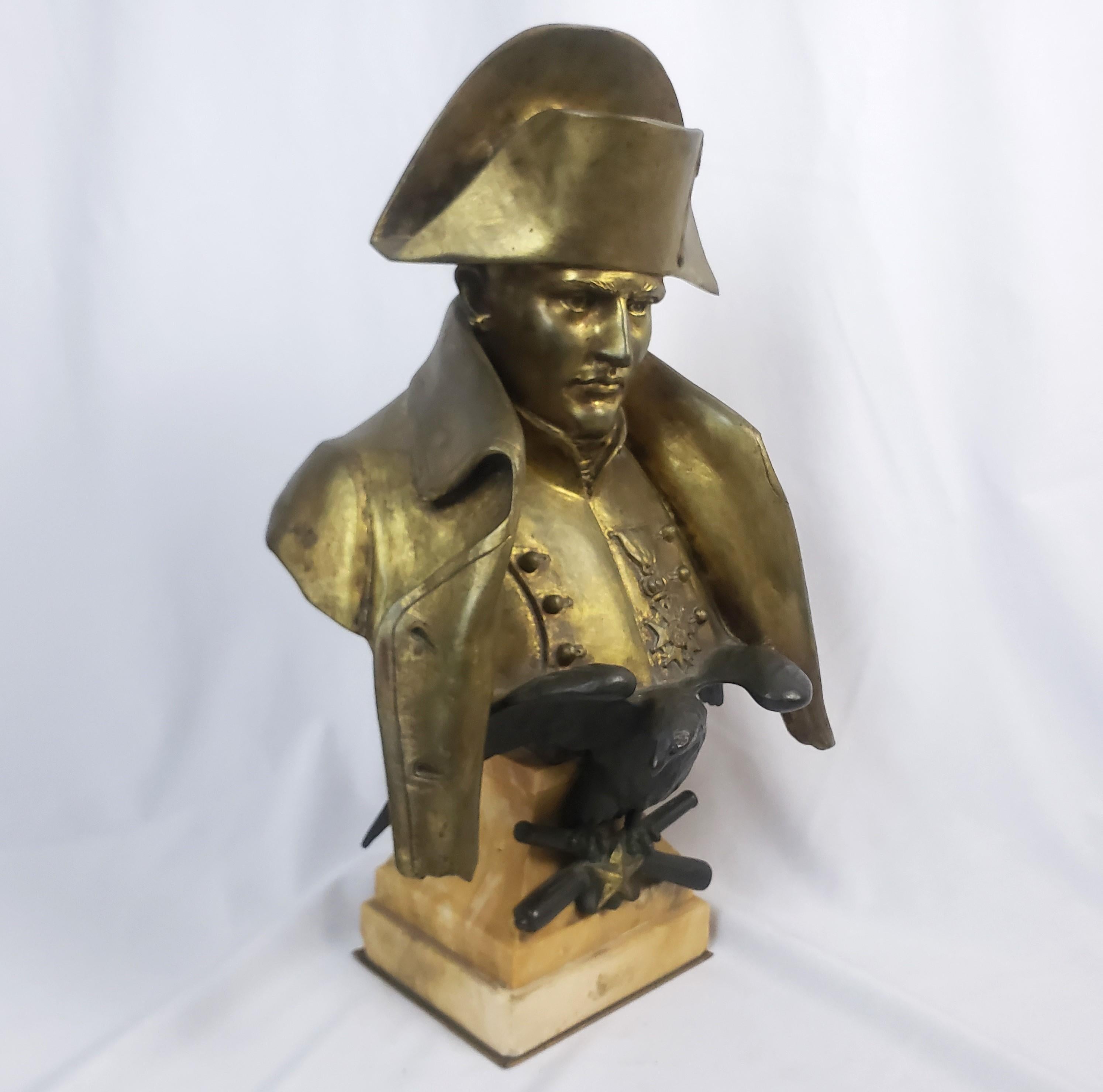 This antique well executed bronze bust was done by the well known Francesco La Monada of France in approximately 1900 in his signature style. The bust depicts a realistic study of Napoleon in uniform with an attached cast eagle and cross cannons on
