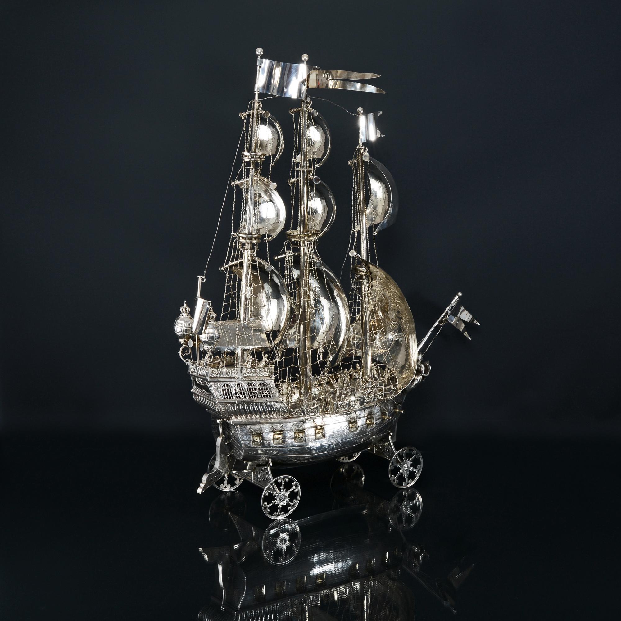 This hugely impressive sterling silver model ship, also known as a nef, was made in Germany by Berthold Müller and bears import hallmarks for Chester 1909.

Based on a stylised 16th century galleon, and made in exceptional detail with three fully