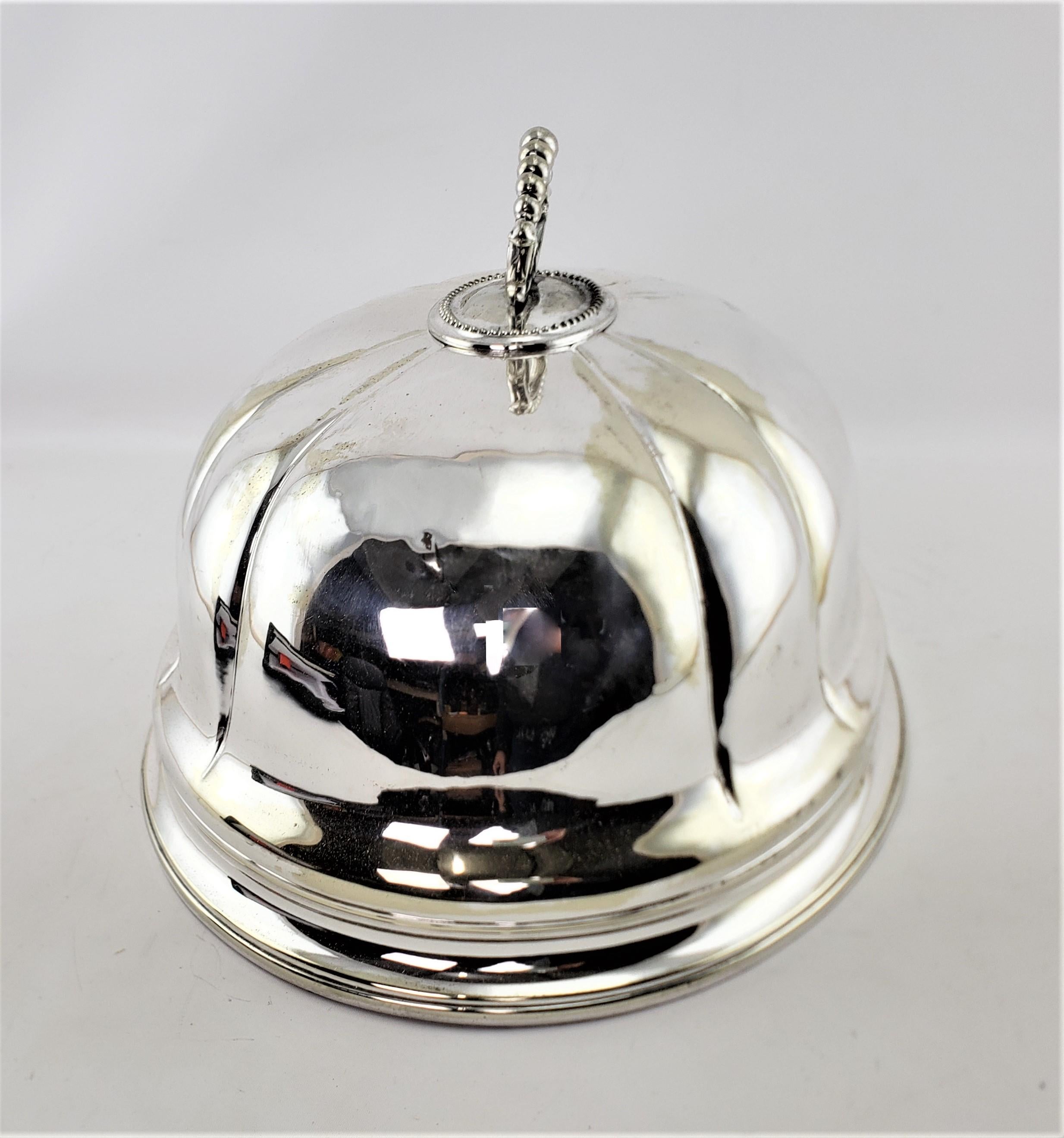 silver food dome