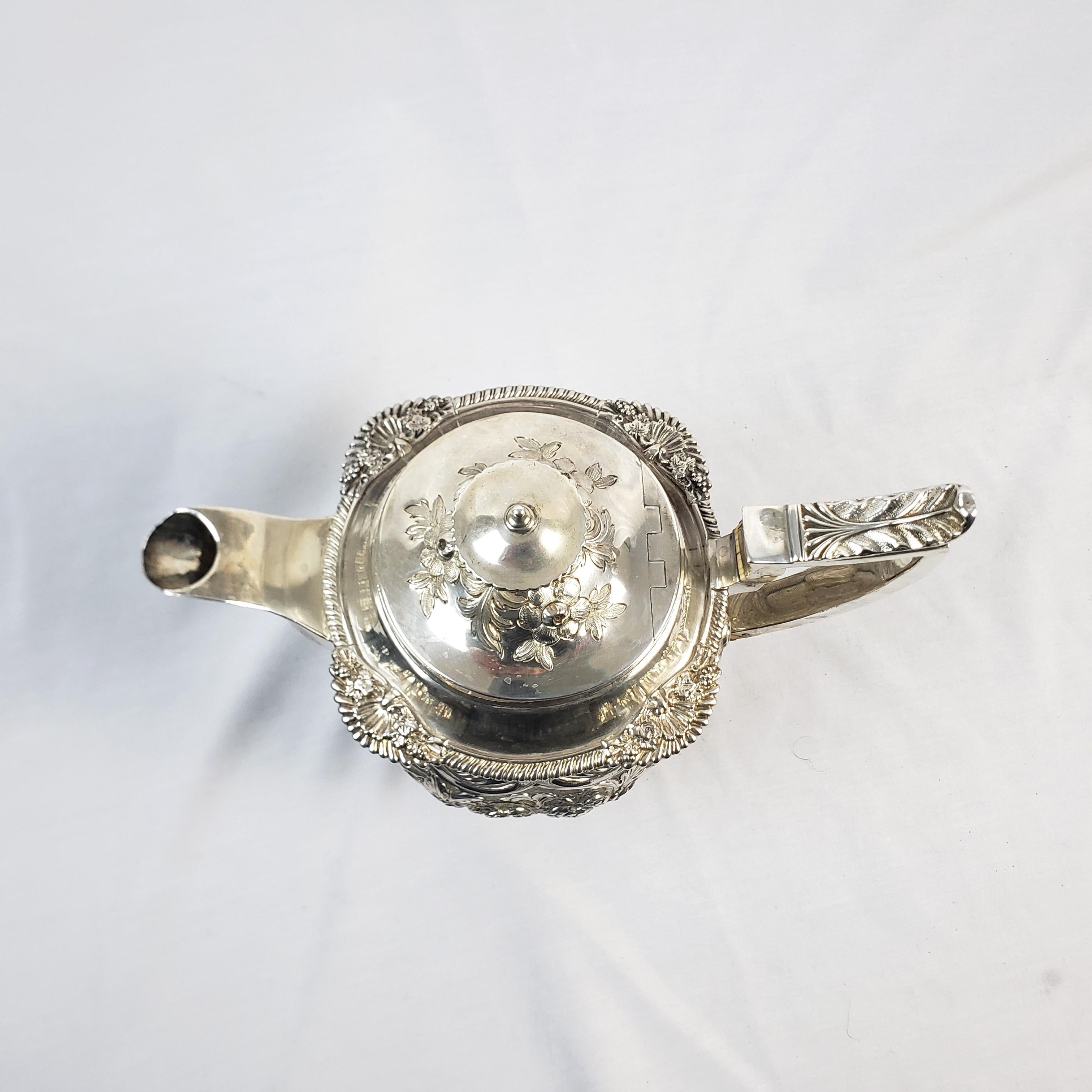 Large Antique Sterling Silver Georgian Teapot with Ornate Repousse Decoration For Sale 1
