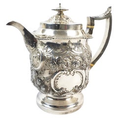 Large Antique Sterling Silver Georgian Teapot with Ornate Repousse Decoration