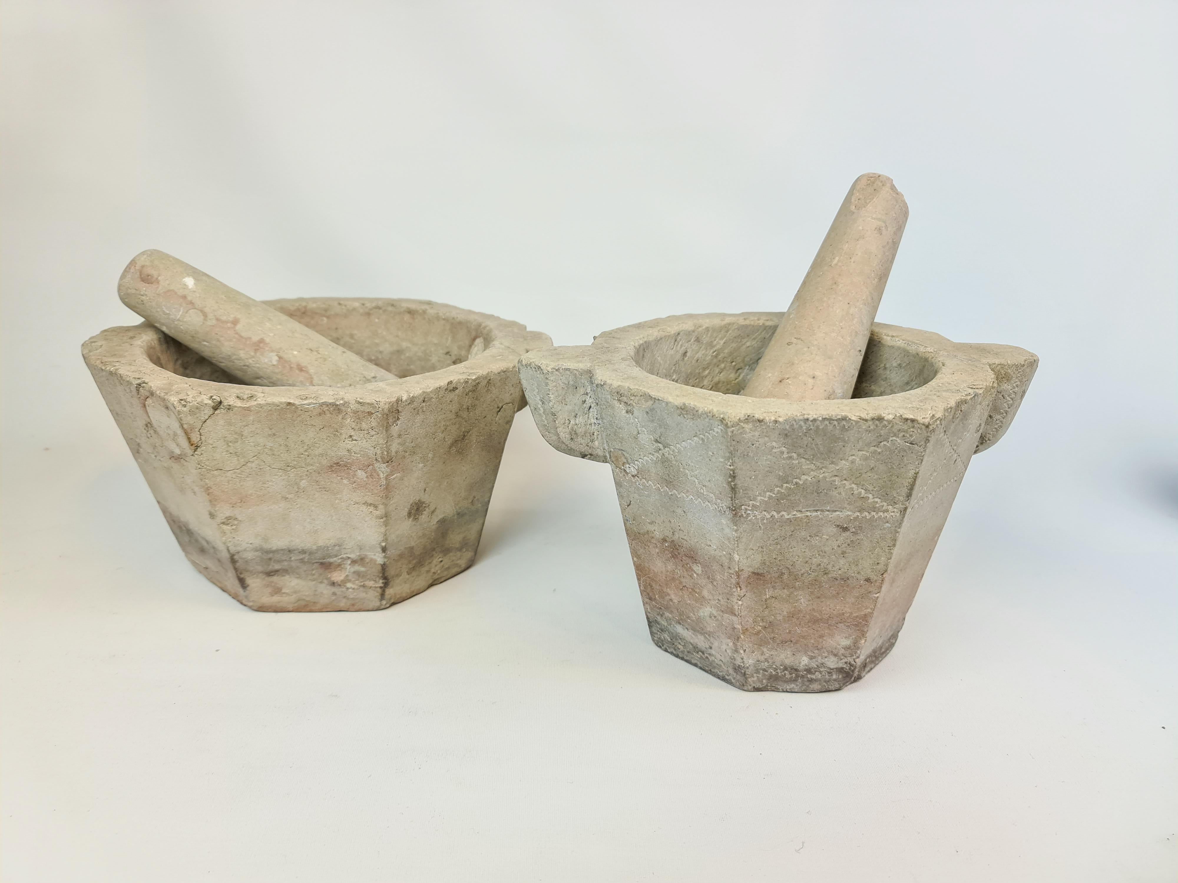 These two larges and heavy mortars made in granite are perfect for display and interior. They are made in Sweden ca 1850s. The stone are shifting in color and there has been a pattern inscribed.   

Antique condition with losses and