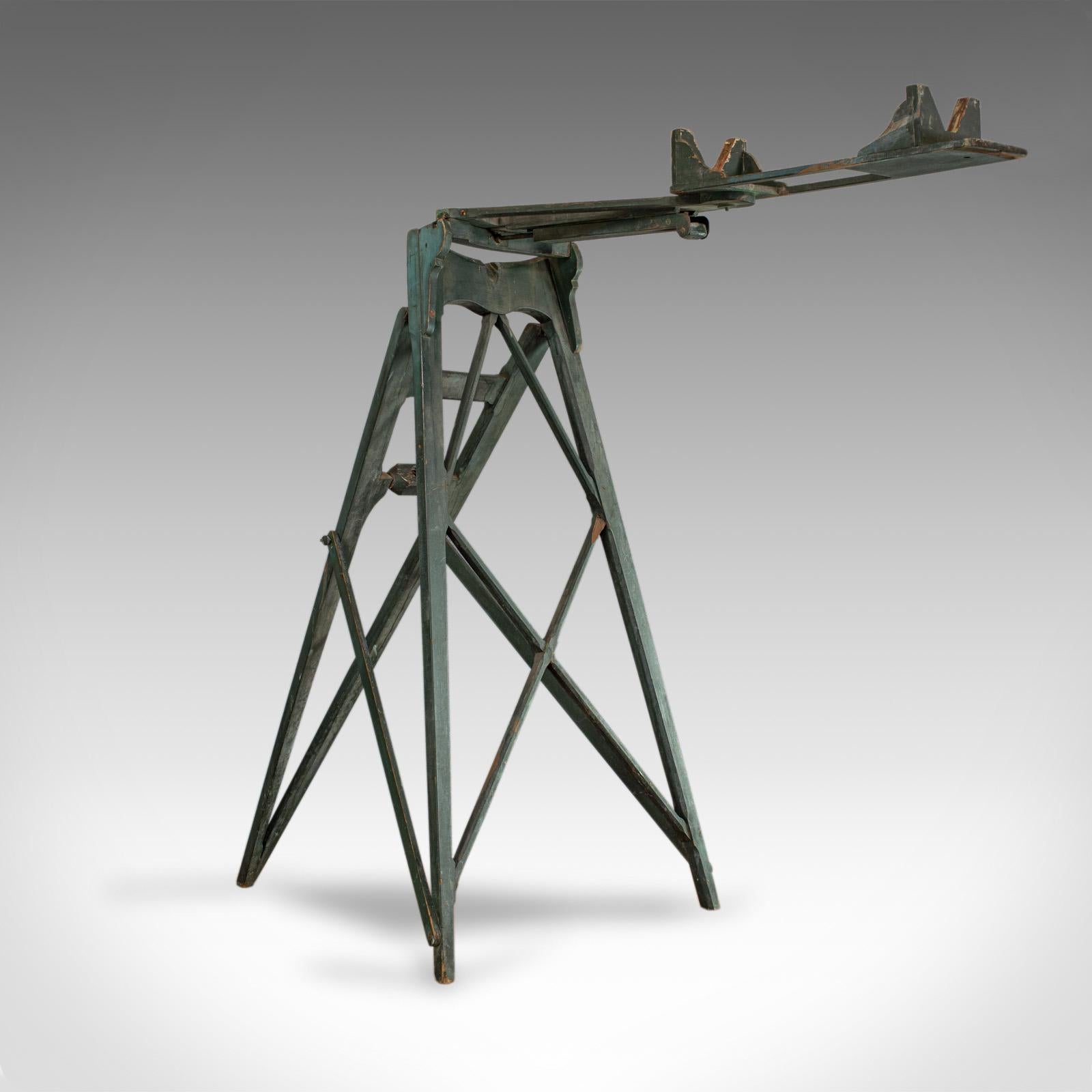 This is a large, antique telescope tripod. An English, pine observatory rack dating to the late 19th century, circa 1900.

Original painted finished displays a desirable aged patina
A rare, observatory telescope rack in large proportion
Highly
