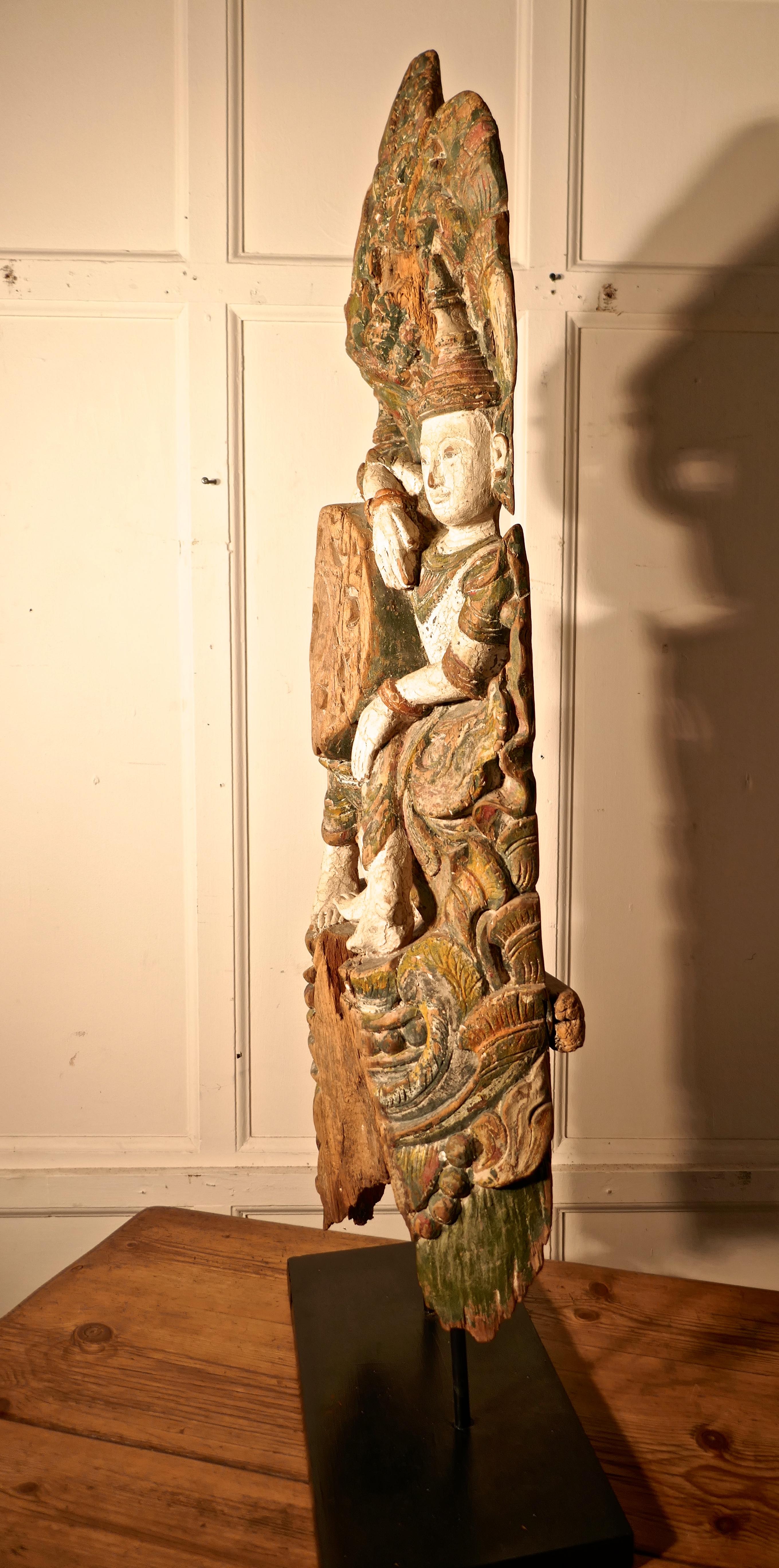 Large antique temple carving, polychrome Buddhist statue.


This wonderful carving, is the top part of larger piece, the paint is a dusty slightly chalky finish, in beautiful muted colours. 
The carving shows 2 figures in a sitting position