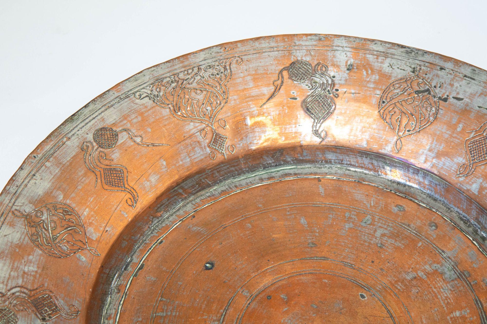 Large tinned copper Rajasthani Asian Metal bowl.
Handcrafted Asian tinned copper metal round vessel bowl.
Beautiful antique Moorish Middle Eastern copper tinned large plate dish bowl with engraved design.
Beautifully aged old copper with a nice