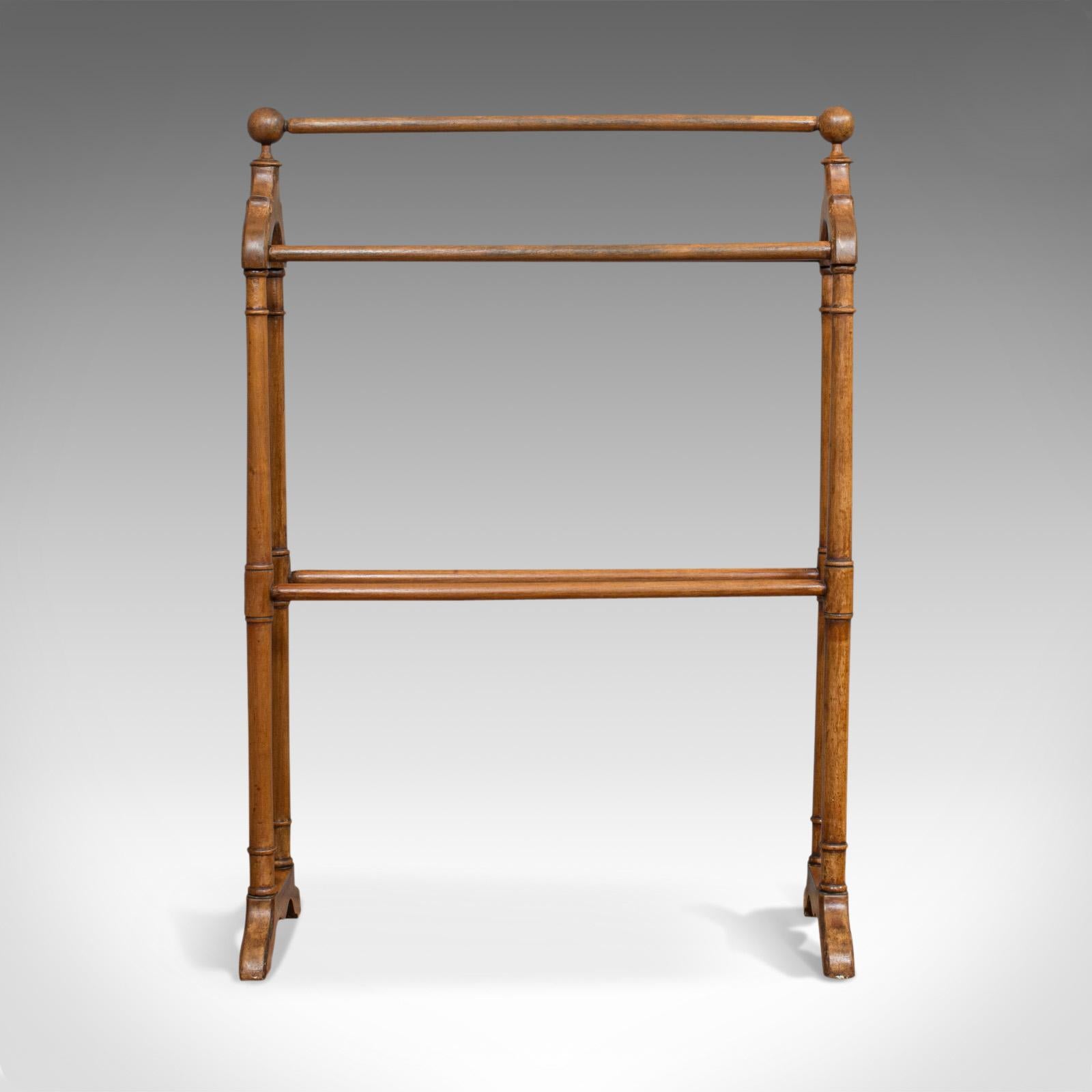 This is a large antique towel rack. An English, mahogany clothes horse or dryer, dating to the Victorian period, circa 1880.

Elegant Victorian framework
Displays a desirable aged patina
Light coloured mahogany shows fine grain interest
Gently