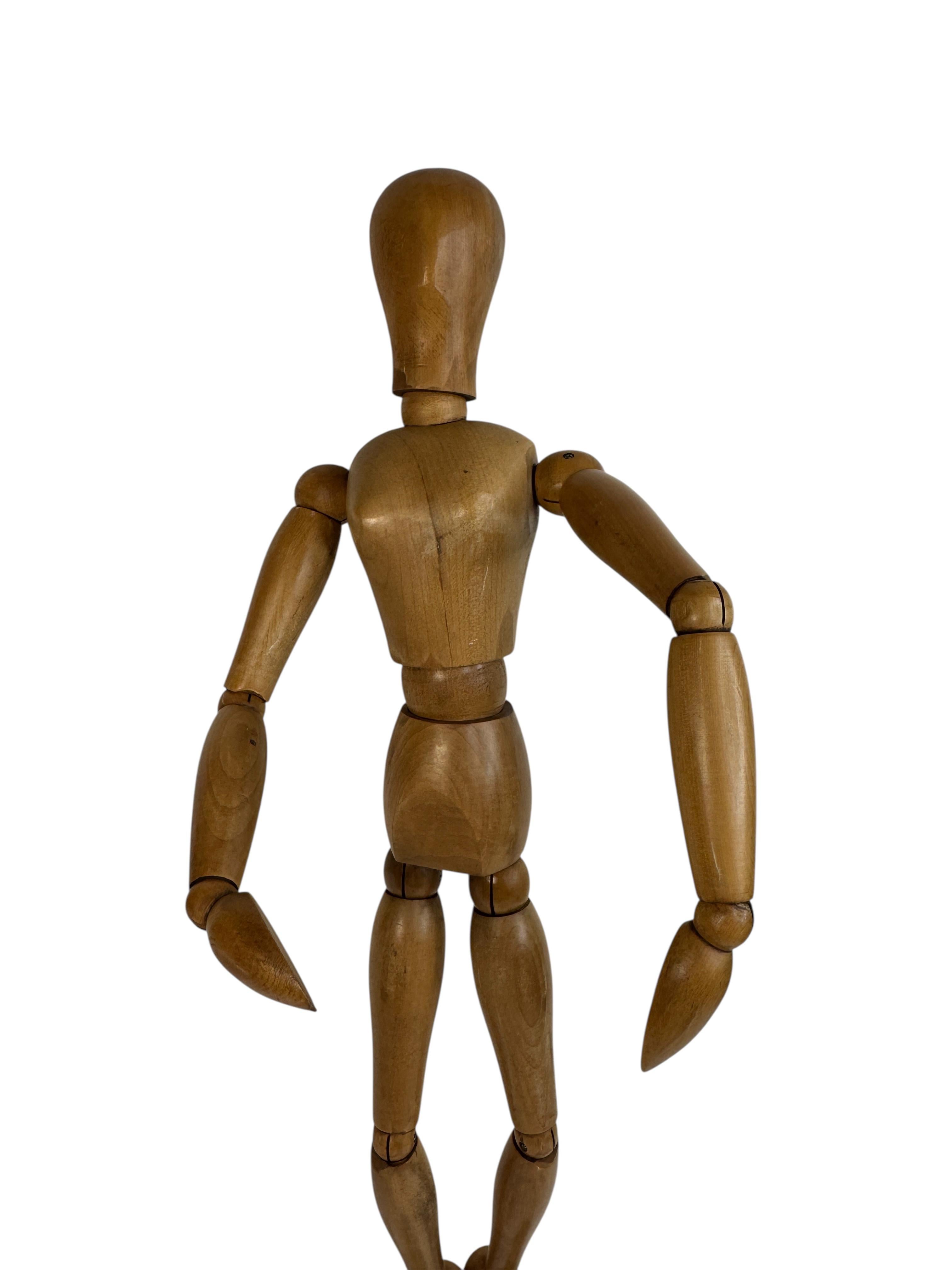 A handmade wooden Artist mannequin model - all joints move as they should. Found on a Estate sale in Modena, Italy.
Shows some minor wear - but looks beautiful on display! Some scratches and a nice patina due to the age. A nice addition to any room.