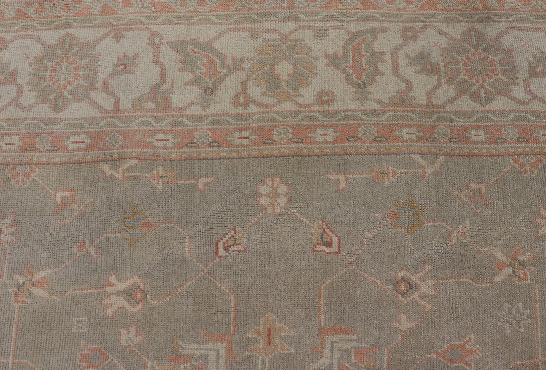 Hand-Knotted Large Antique Turkish Oushak With Medallion in Green and Pink 13'4 x 16'4 For Sale