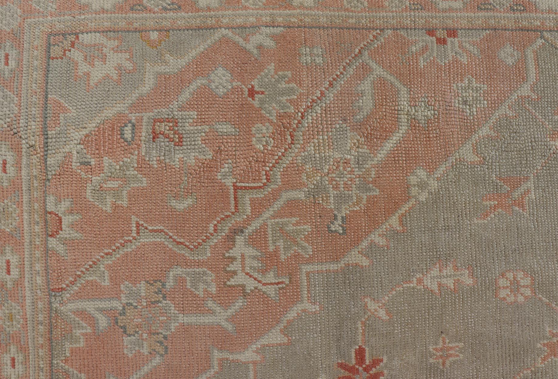 Large Antique Turkish Oushak With Medallion in Green and Pink 13'4 x 16'4 In Excellent Condition For Sale In Atlanta, GA