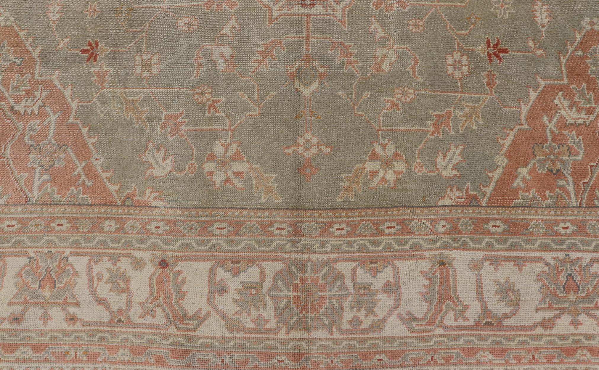 20th Century Large Antique Turkish Oushak With Medallion in Green and Pink 13'4 x 16'4 For Sale