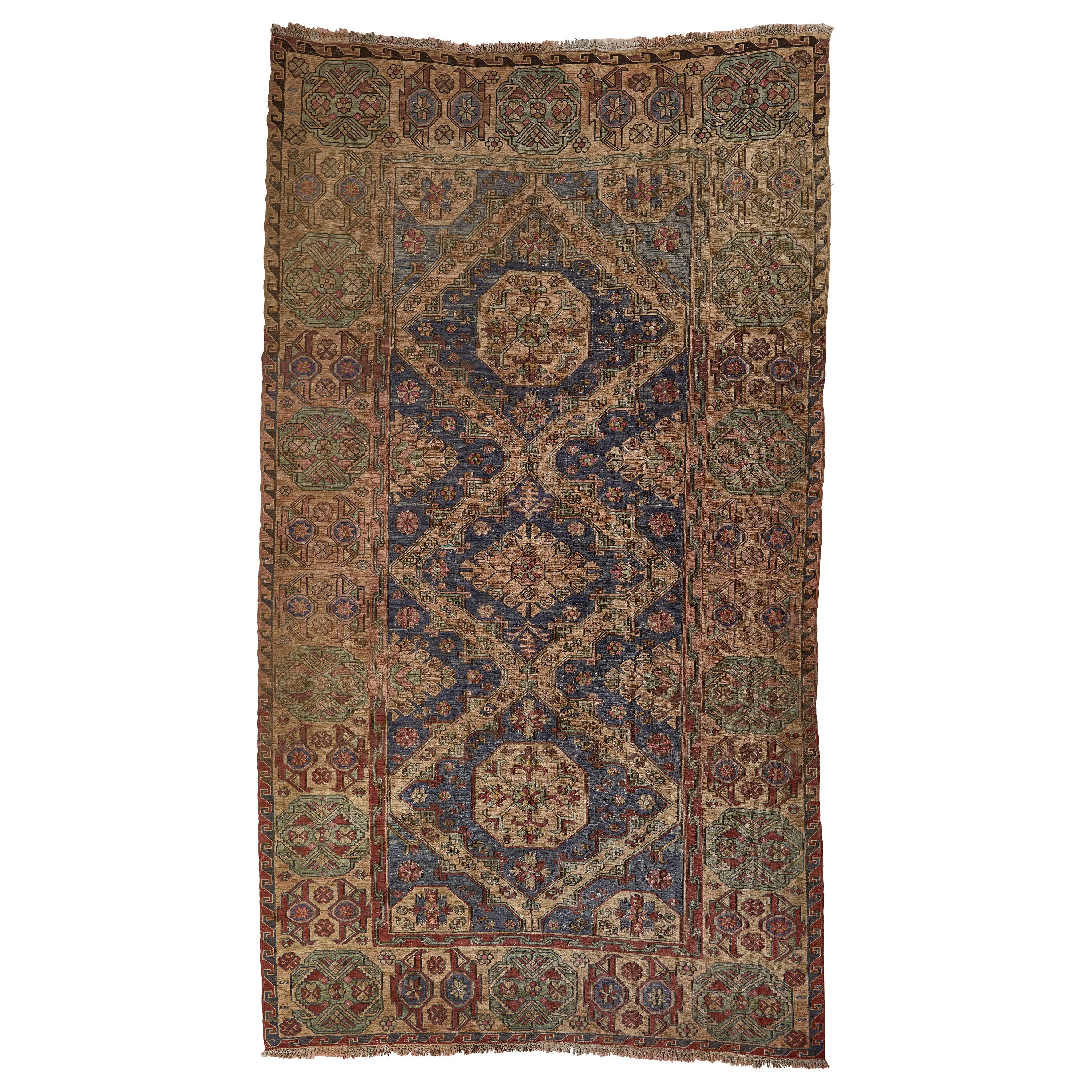 Large Antique Caucasian Rug with Intricate Details