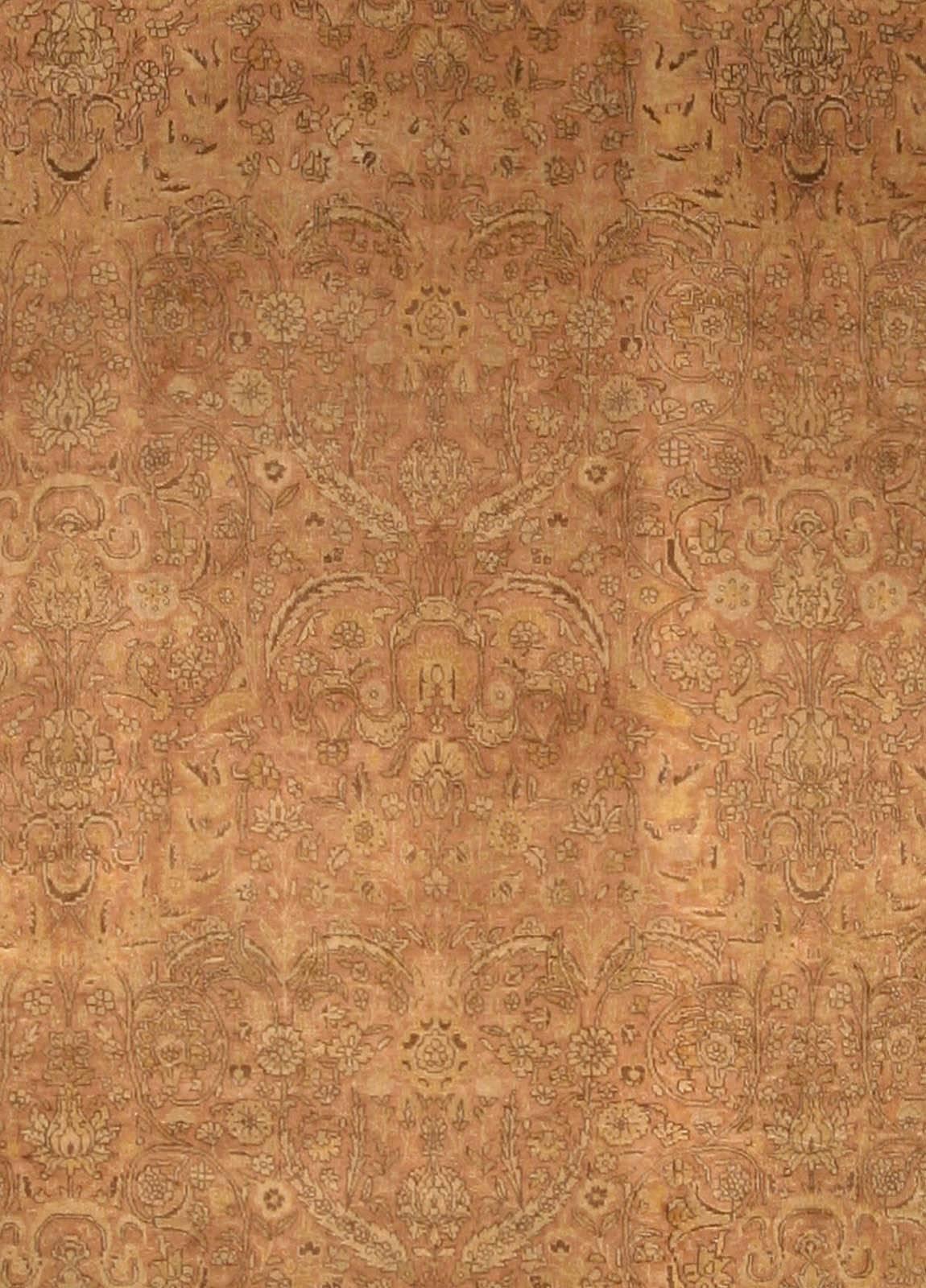 An early 20th century Turkish Sivas rug, the light brown field with a serrated leaf, flowering vinery and blossom trellis overall, within a beige linked cartouche border.