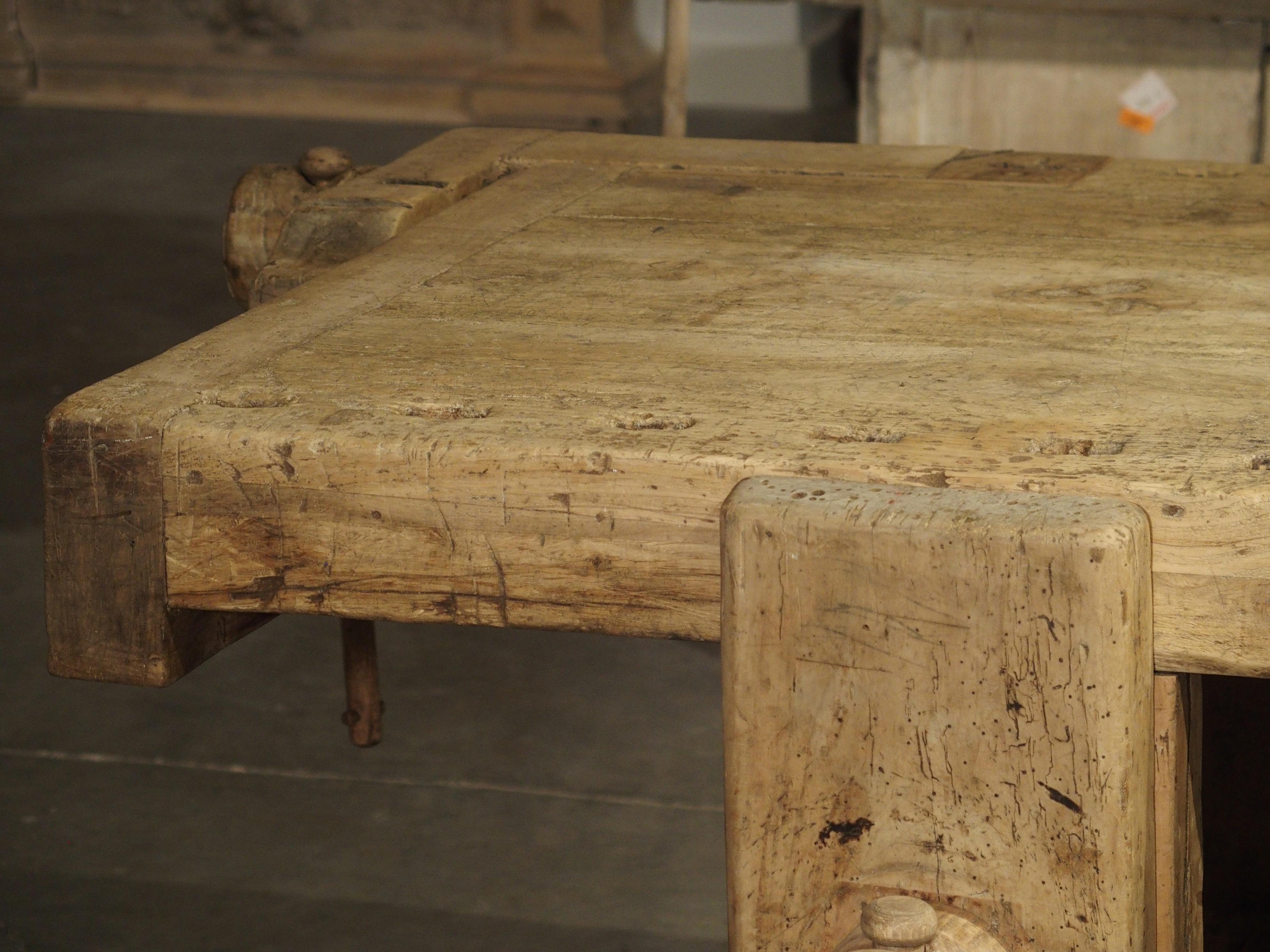 This fabulous antique Tuscan work bench is over 9 feet long and just under 4 feet wide. It is largest table of this type that we have found, which makes it perfect for a kitchen island, large sofa table, or work table. Along the periphery of the top