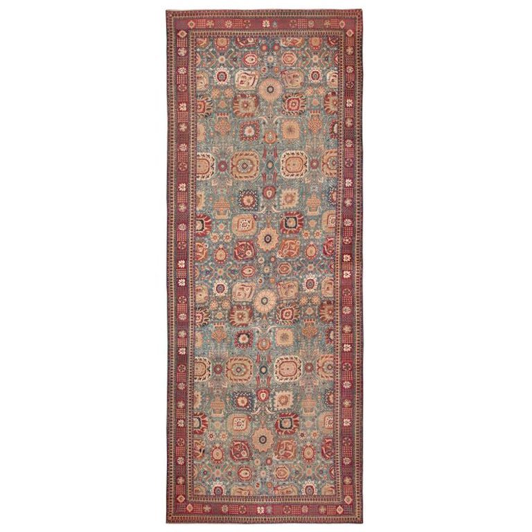 Oversized vase design antique Indian Agra rug, country of origin: India, date circa late 19th century. Size: 13 ft. x 34 ft. (3.96 m x 10.36 m)

This stunning large vase design antique Indian Agra rug is a masterpiece of bold beauty. Beautiful