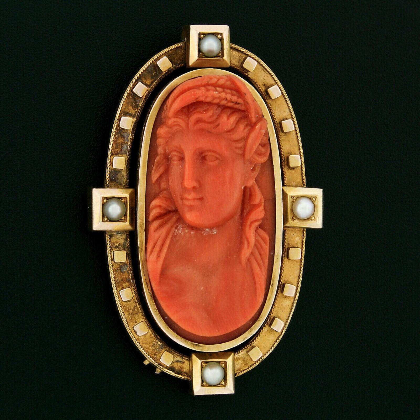 Here we have an antique brooch with an enhancer hook that was crafted from solid 18k yellow gold during the Victorian era. The brooch features a magnificent piece of natural coral that is bezel set at its center. The elongated oval coral is a deep,