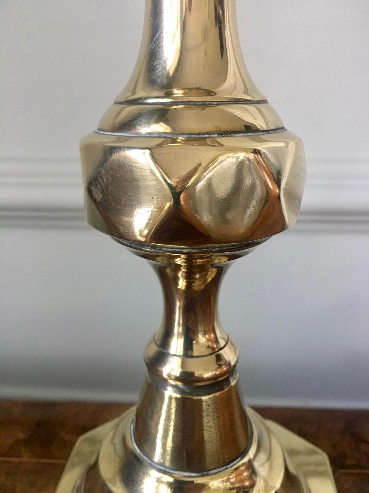 Large antique Victorian brass candlesticks having very attractive turned columns with a diamond design, square stepped base and original push ups.

In lovely original condition.

Measures: H 27.5cm
W 10.5cm
D 10cm.



 