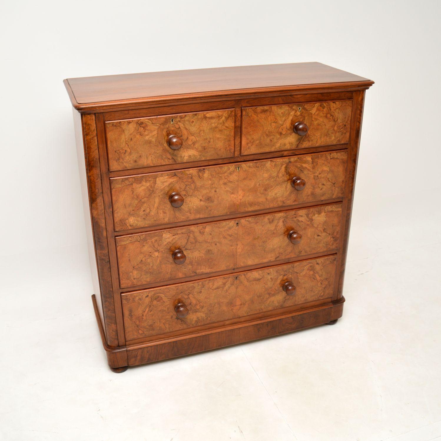 A magnificent & large antique Victorian burr walnut chest of drawers. This was made in England, it dates from the 1860-80’s.

The quality is outstanding, this is a large and very useful piece. There is lots of storage space within the generous