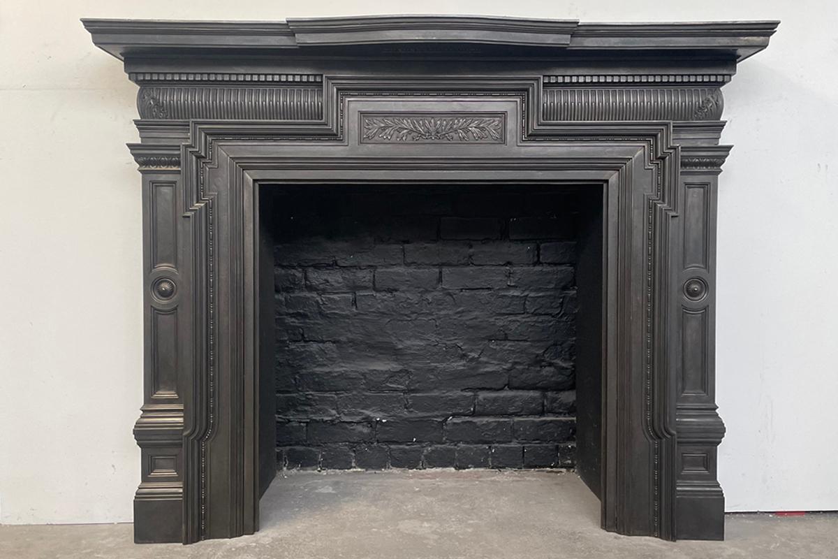 'The Beechfield'. A spectacular and large antique Victorian cast iron fireplace surround. Dated 1898. Removed from a residential property in London.

This surround has been finished with a dark wax finish, giving a slightly bronze glow to it. It