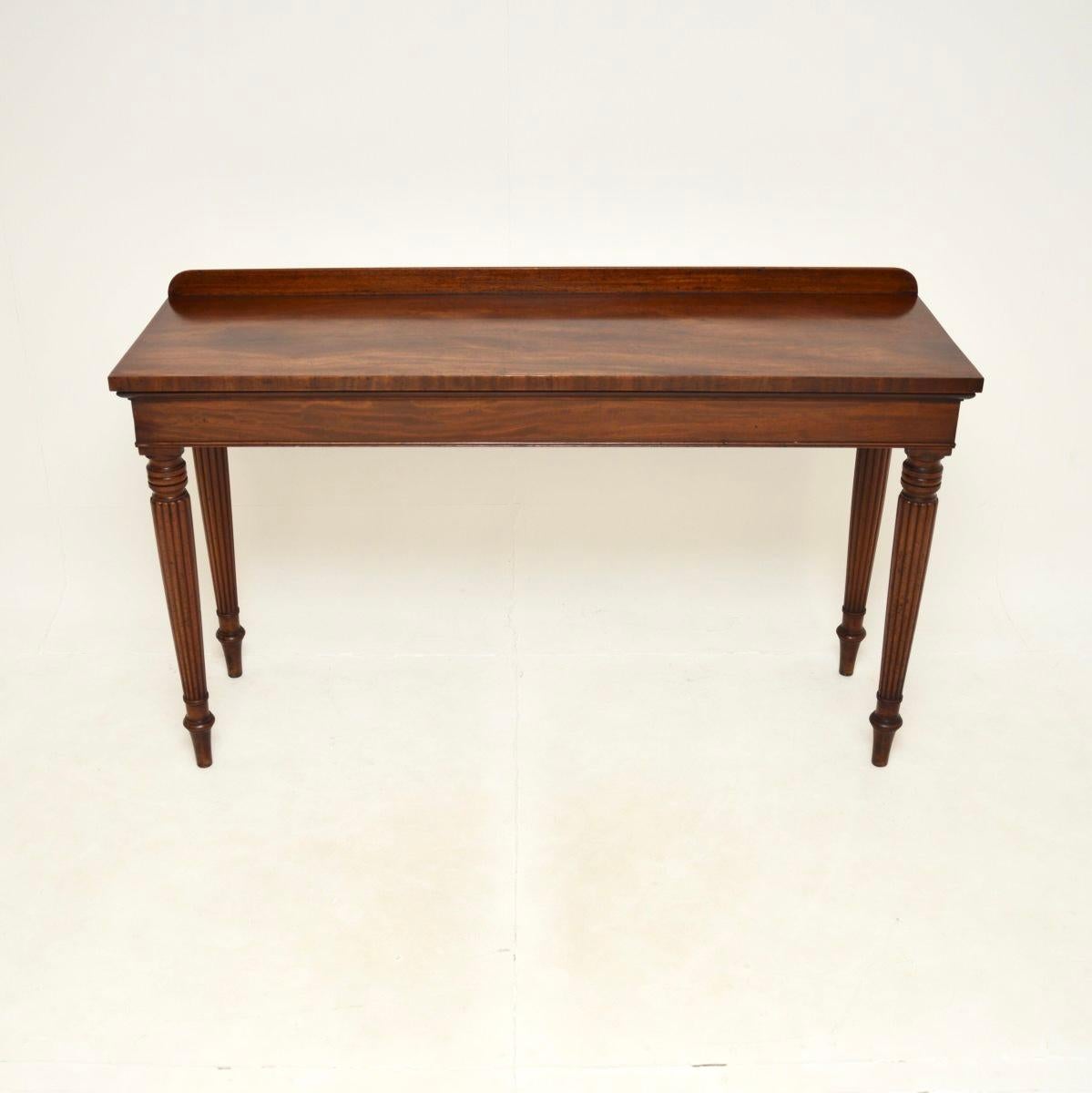 An outstanding large antique Victorian console table, made in England and dating from around the 1840-1850 period.

Crafted of the utmost quality, it is a large and impressive size. It's extremely rare to find an early model like this. The legs are
