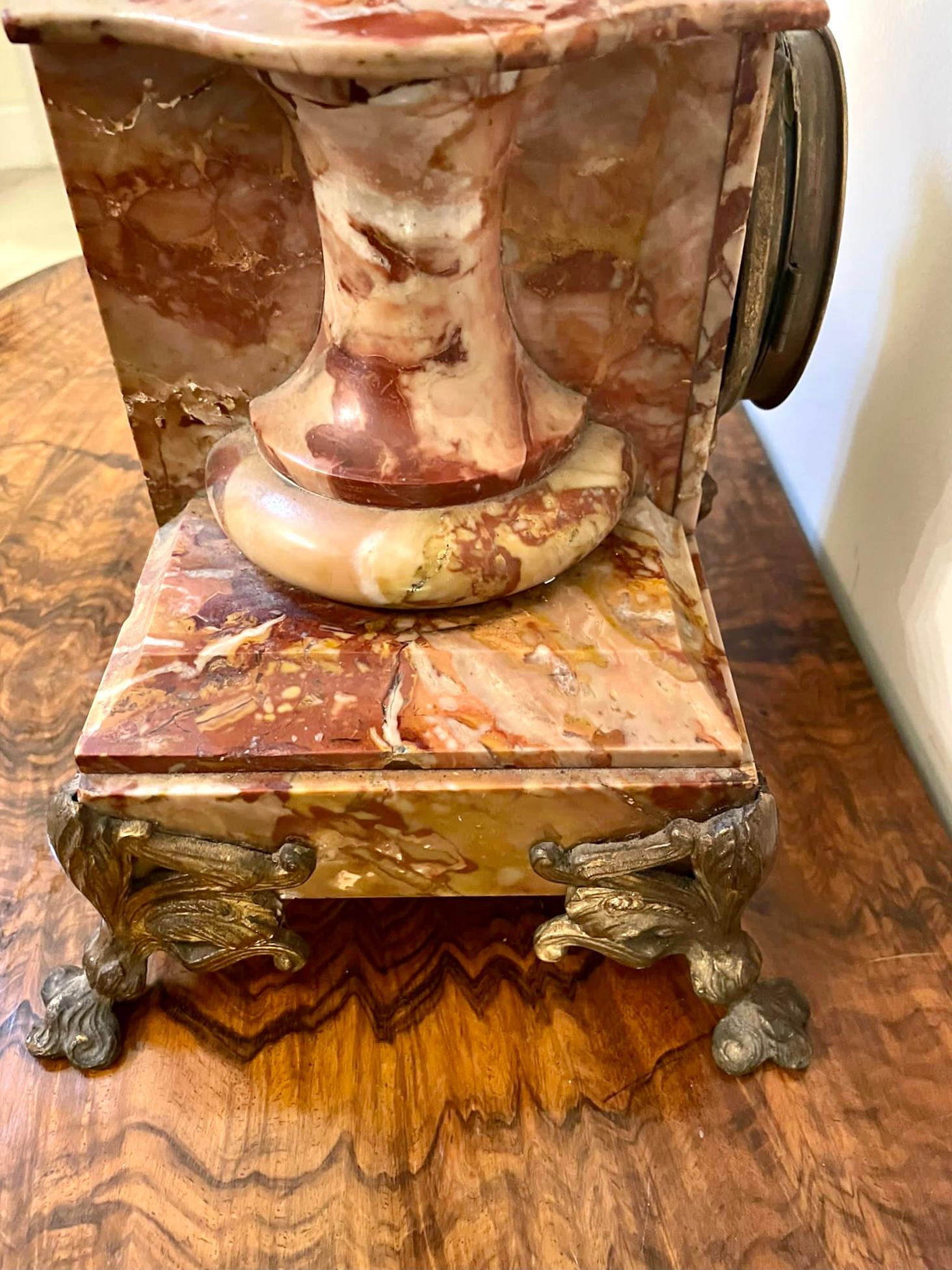 Large antique Victorian French mantel clock having a quality superb coloured marble base with an attractive ornate brass bezel, painted dial with original hands and surmounted by a spelter figure of a blacksmith.

A delightful example in good