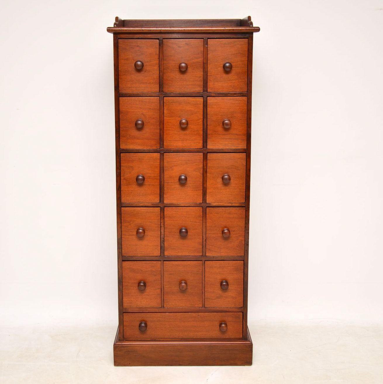 Antique Victorian mahogany apothecary chest in great condition dating from the 1860-1880s period. It’s a nice useful design, with five rows of three drawers and a longer drawer at the bottom all with turned mahogany handles. There’s a gallery on the