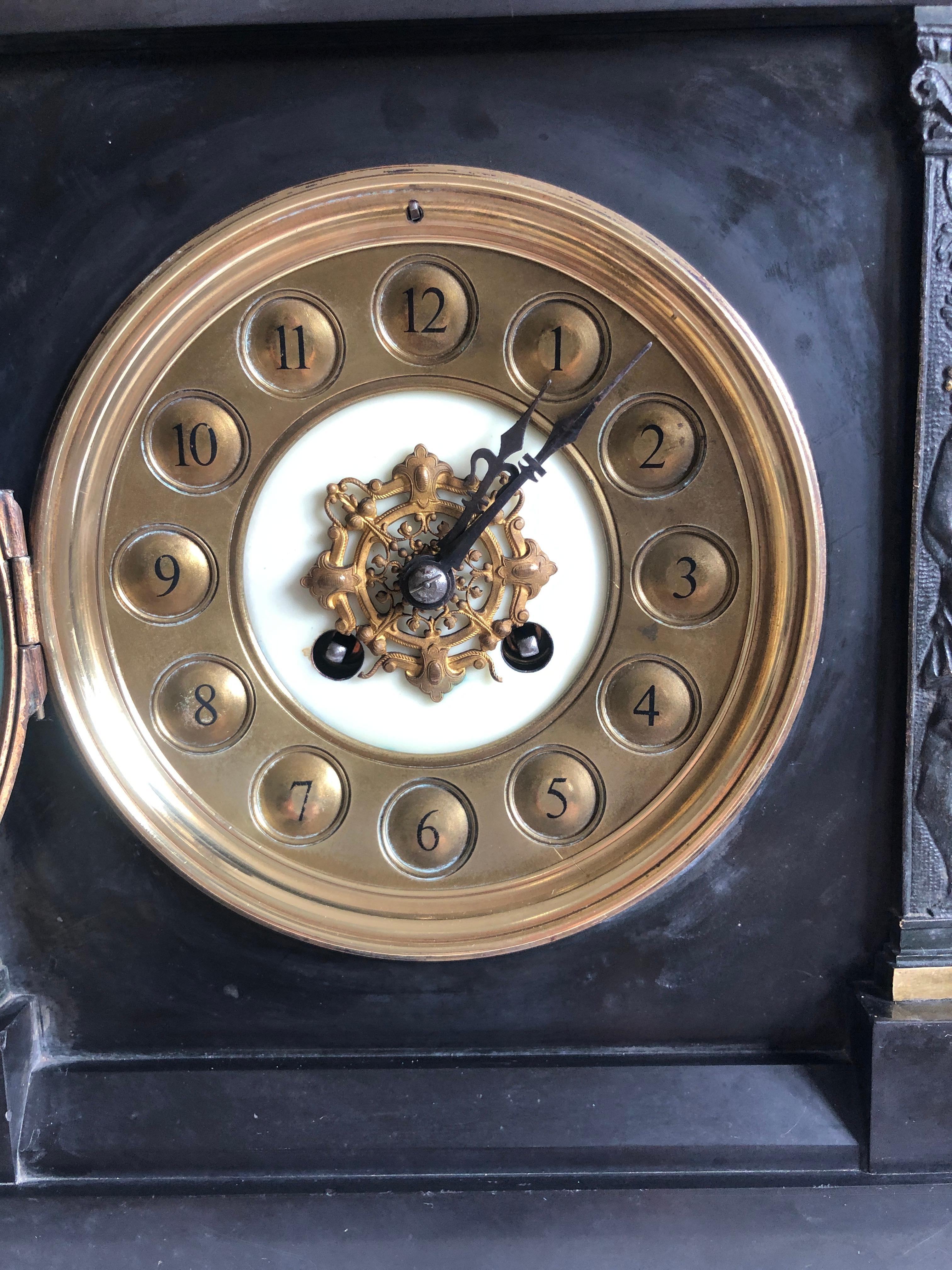 Large antique Victorian marble mantle clock. This attractive clock has 3 shaped domes to the top with decorative brass finials. Raised above an architectural shaped panel with a brass motif. An eight day striking movement, original hands, splendid