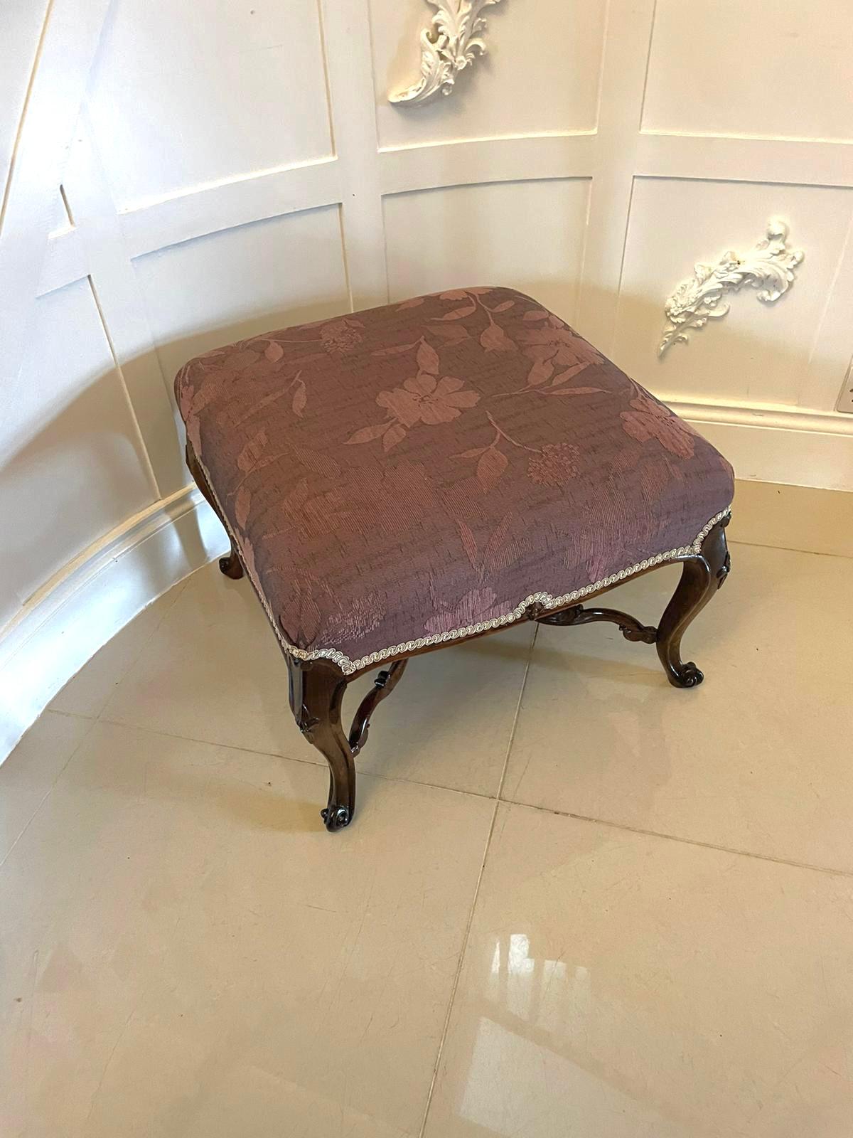 Large antique Victorian quality carved rosewood stool having a newly reupholstered seat in a quality lavender colour stylish fabric, carved rosewood frieze, standing on shaped carved rosewood cabriole legs with scroll feet united by a shaped carved