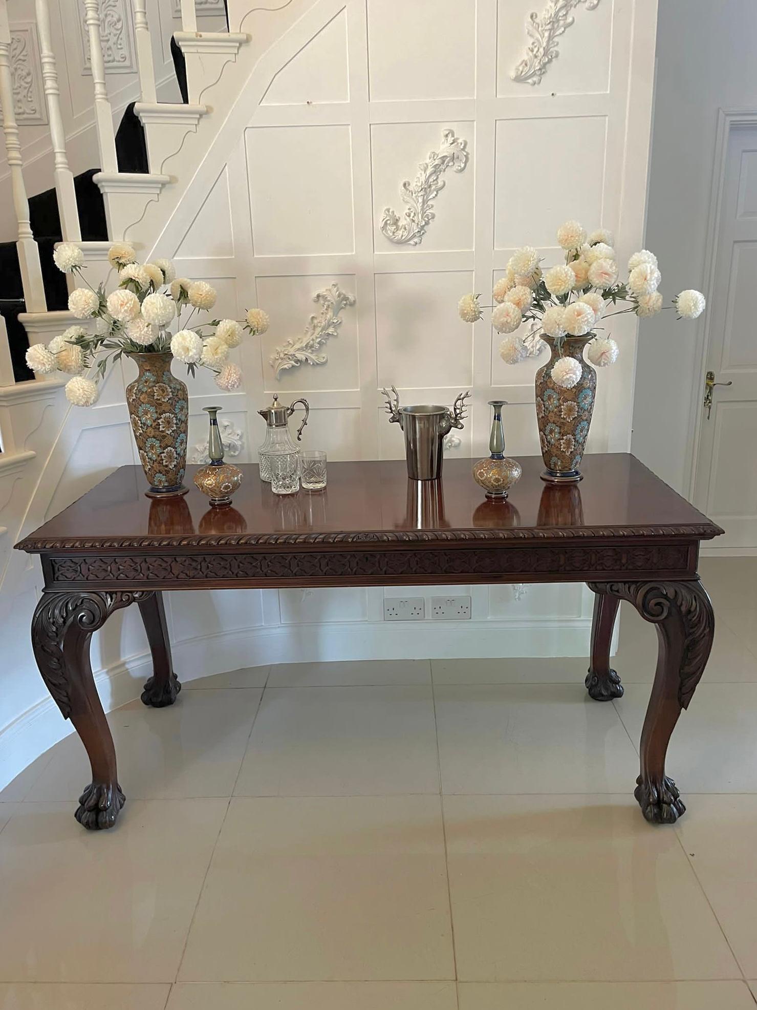 Large antique Victorian quality freestanding carved mahogany centre table having a large quality freestanding mahogany rectangular shaped top with a carved edge, fabulous carved frieze with a single drawer and standing on four unbelievable quality