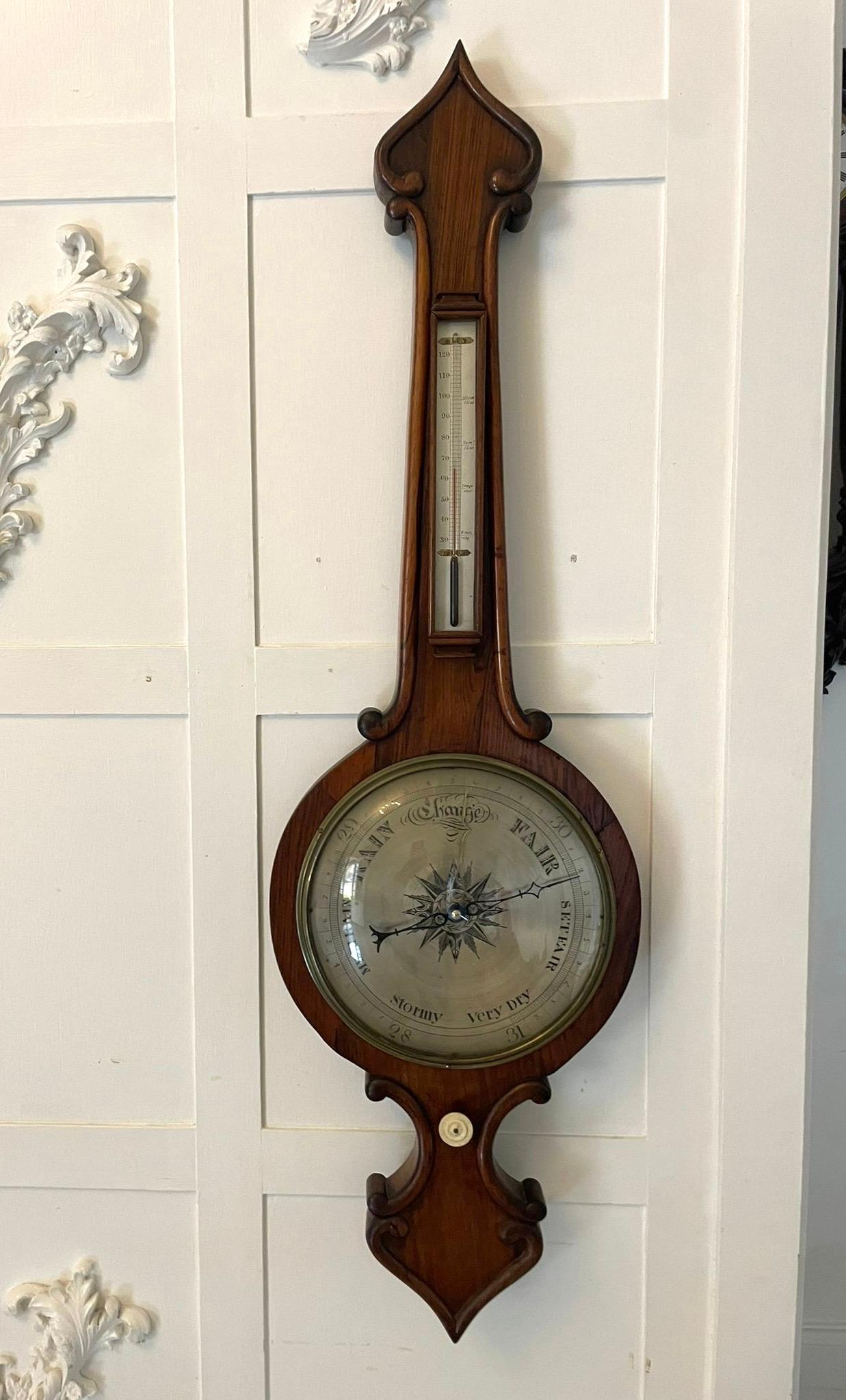 Large antique Victorian quality rosewood banjo barometer having a quality rosewood banjo shaped case with carved scroll decoration with a thermometer and 10 inch circular silvered dial with original hands and a brass bezel


In lovely condition and