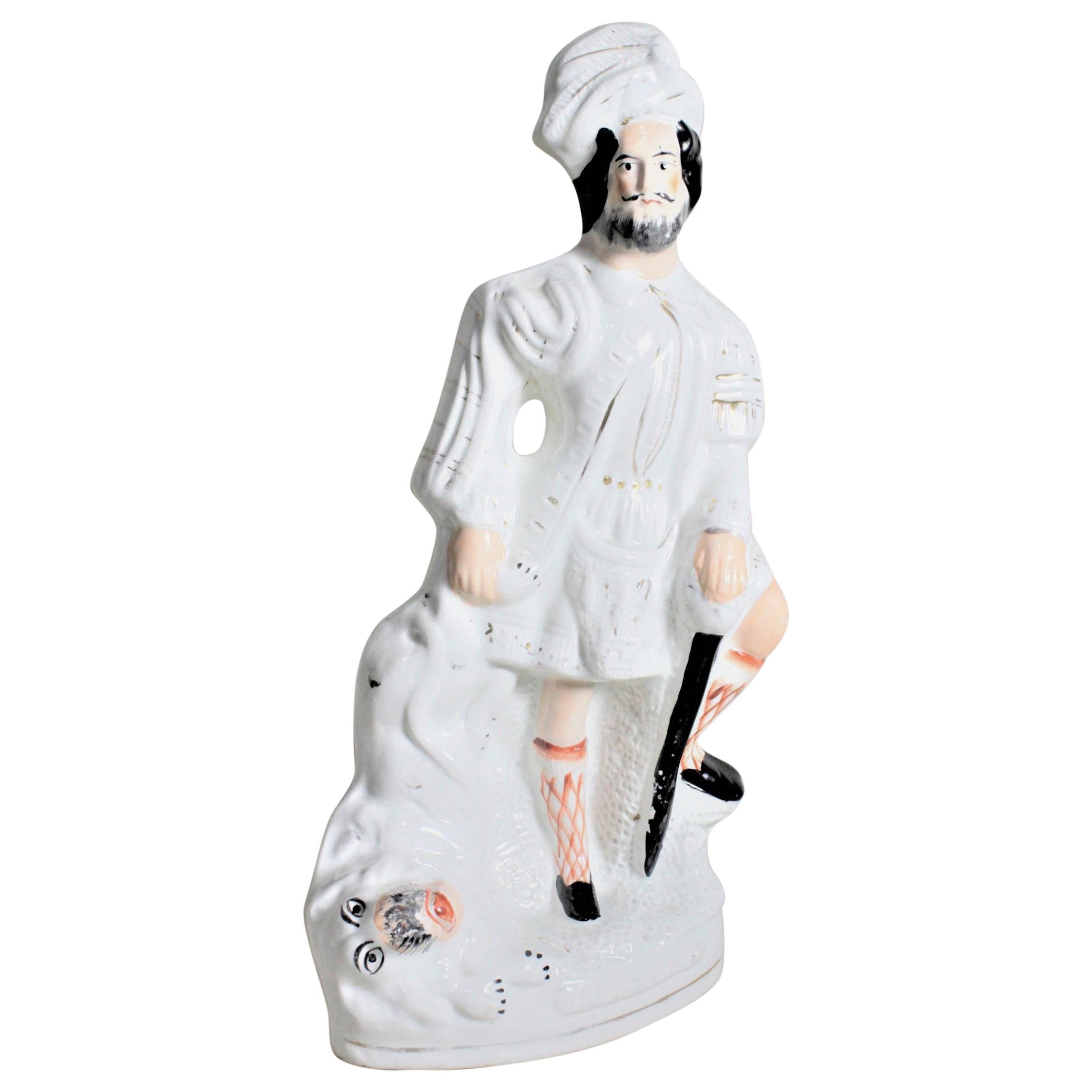 Grande figurine victorienne ancienne du Staffordshire peinte à la main « Le chasseur de lion » en vente