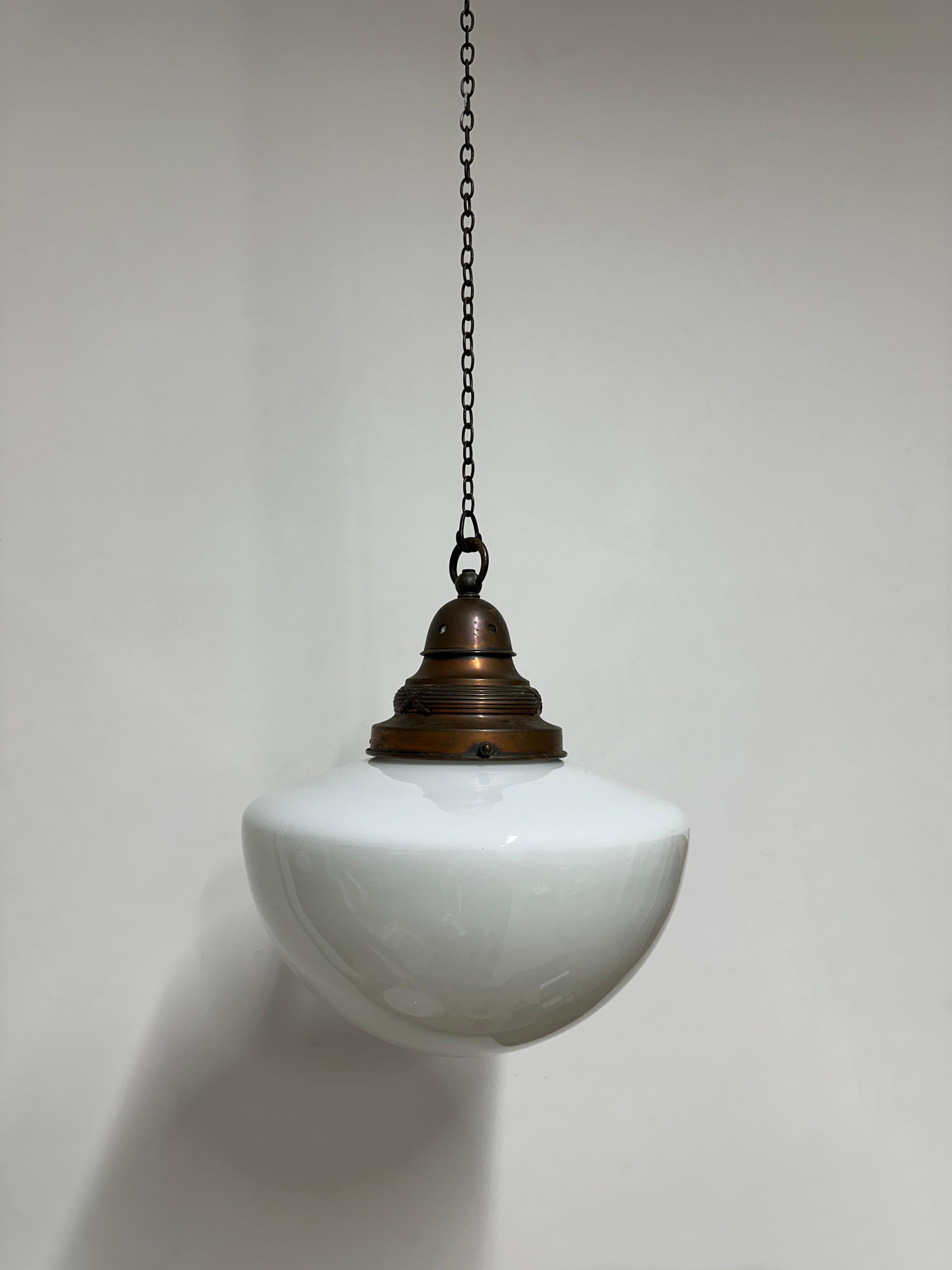 - A beautiful church opaline pendant light with patinated decorative gallery, England circa 1930.
- Wear commensurate with age, all in very good condition, lovely deep oval shape to the opaline glass and the patinated copper gallery has a wonderful