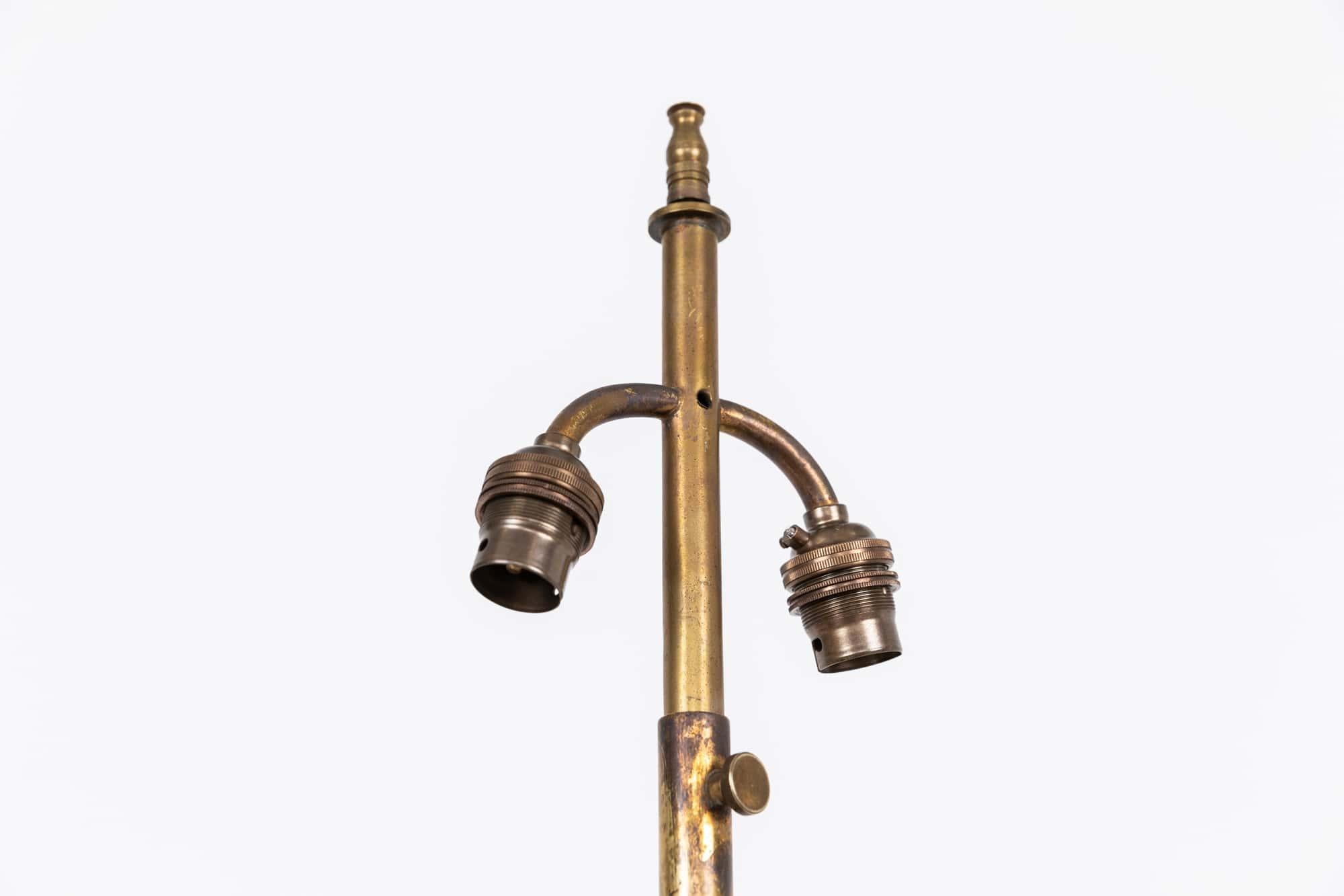 

A very elegant turned large brass table lamp. c.1900

Likely converted from a former candlestick, this lamp is of exceptional quality and has developed a beautiful patina over time. Can be extended in height.

Rewired with 2m of black twist flex