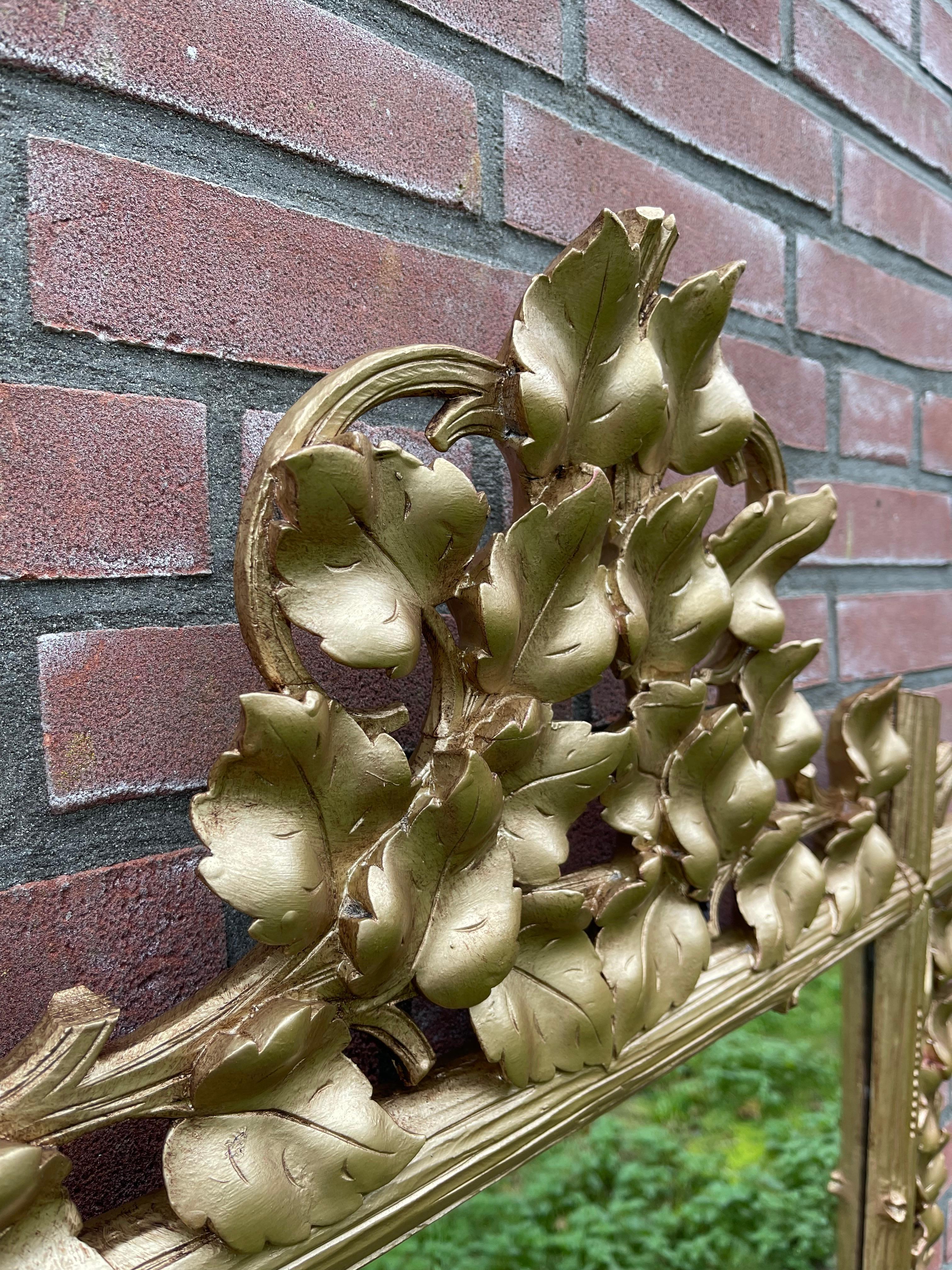 Hand-Carved Large Antique Wall Mirror in a Stunning Hand Carved Frame with Branches & Leafs For Sale