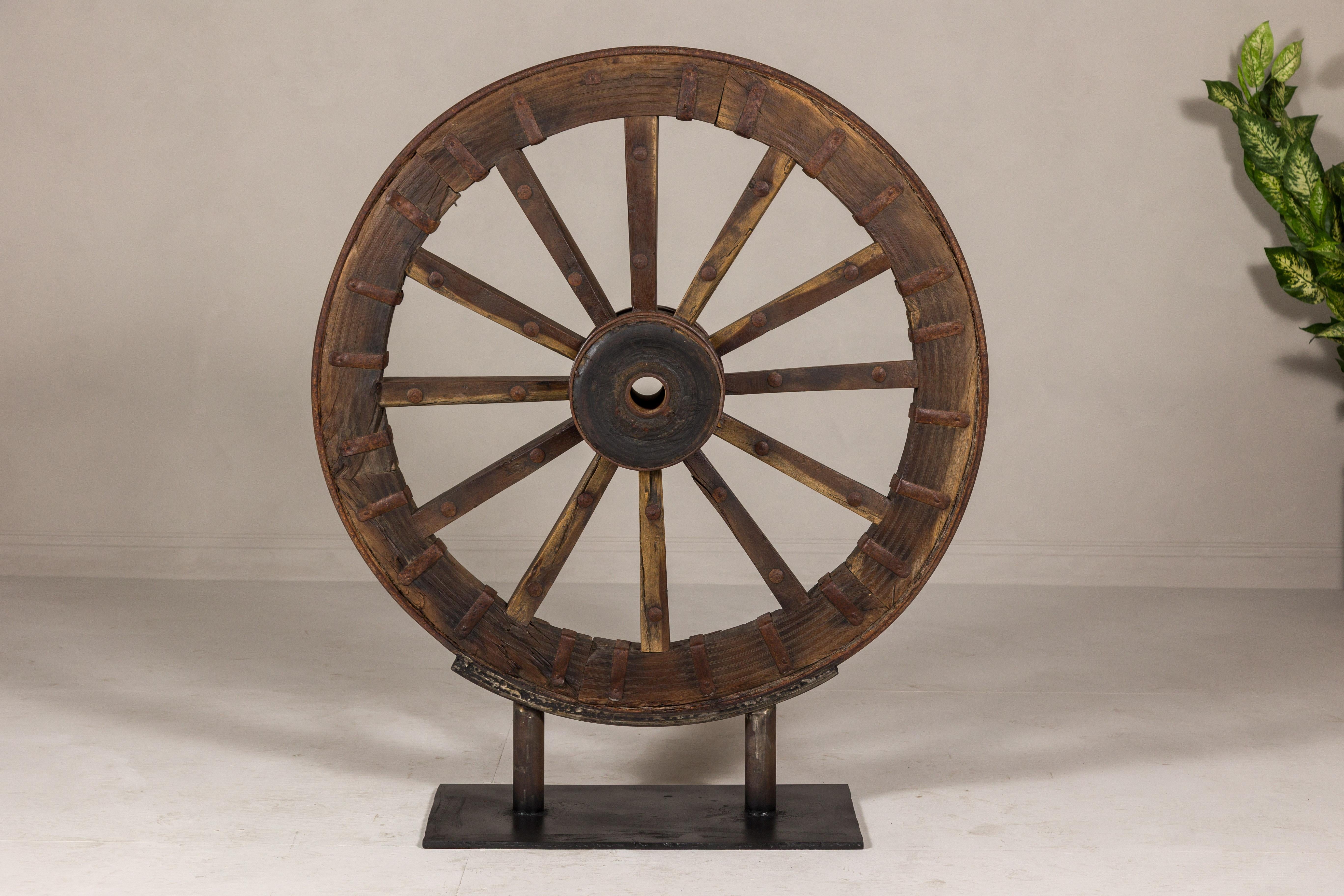 Large Antique Wood and Metal Cart Wheel Mounted on Custom Base For Sale 7