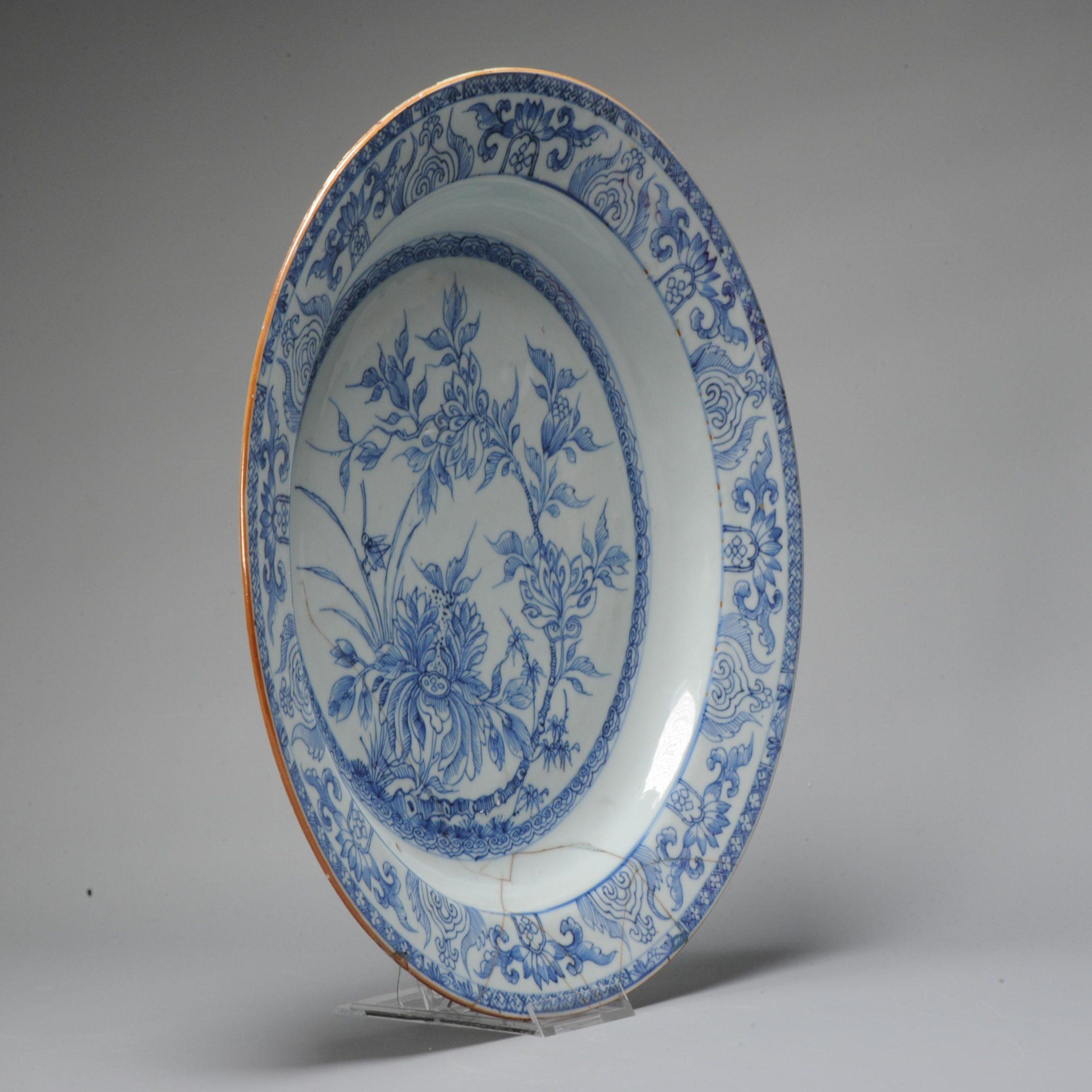 A highly unusual and high quality Charger from the 18th century, yongzheng period. Very thinly potted. With a lovely scene of flowers, grashoppers and geometric design.

Additional information:
Material: Porcelain & Pottery
Color: Blue &