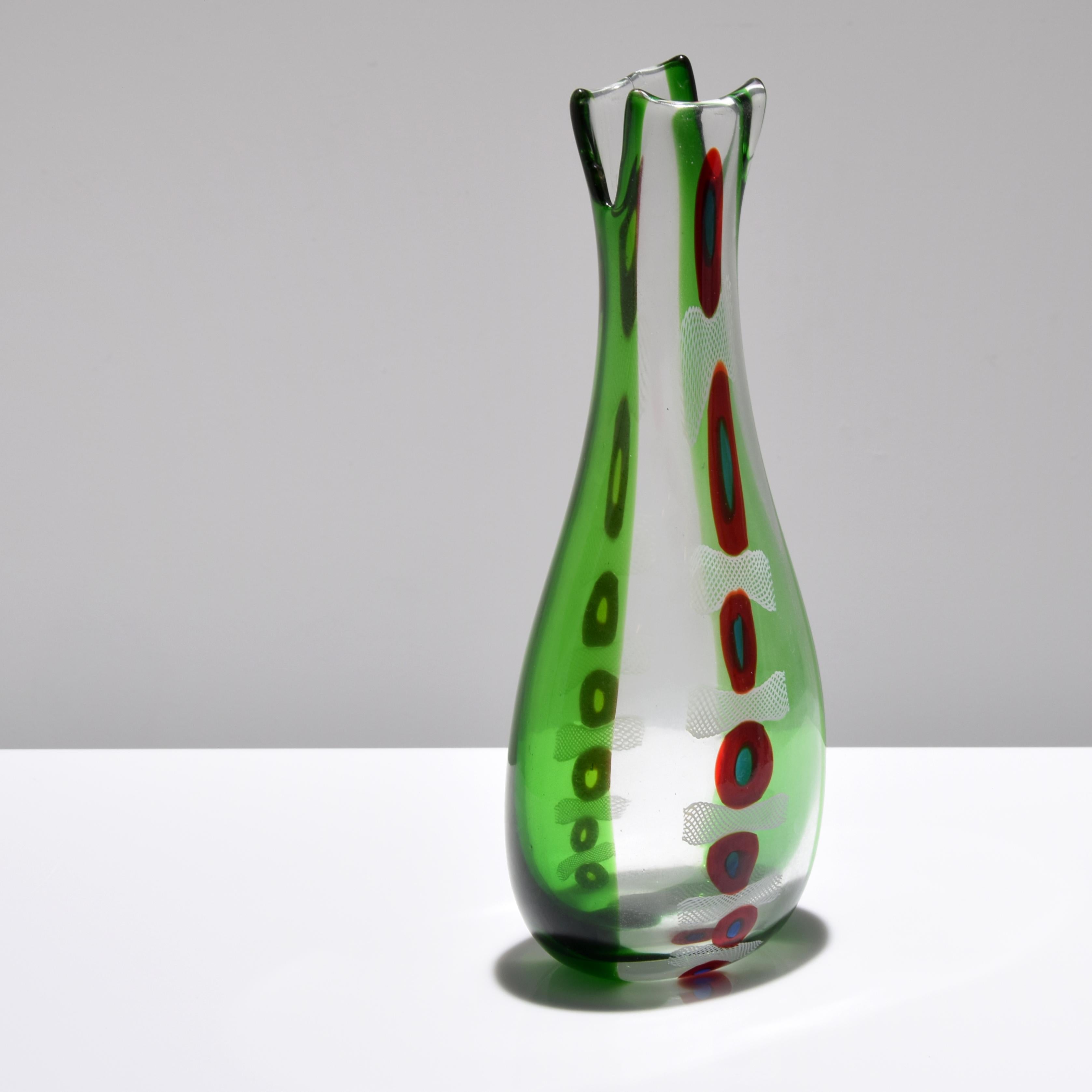 Artistics/Designer ; Fabricant : Anzolo Fuga ; Arte Vetraria Muranese (A.V.E.M.)
Marquage(s) ; notes : pas de marquage(s) apparent(s)
Pays d'origine ; matériaux : Italie ; verre
Dimensions (H, L, P) : 17 