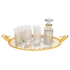 Gran juego de aperitivo en metal chapado en oro de 24 quilates y cristal, S. XIX.