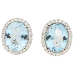 Large Aquamarine and Diamond Cluster Halo Earrings Set in 18 Karat White Gold