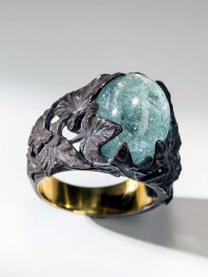 Big patinated and gold plated silver ring with cabochon of natural Aquamarine blue Beryl
aquamarine weight - 16.15 carats
aquamarine measurements - 0.39 x 0.43 x 0.59 in / 10 х 11 х 15 mm
ring weight - 12.65 grams
ring size - 7.75 US

Ivy