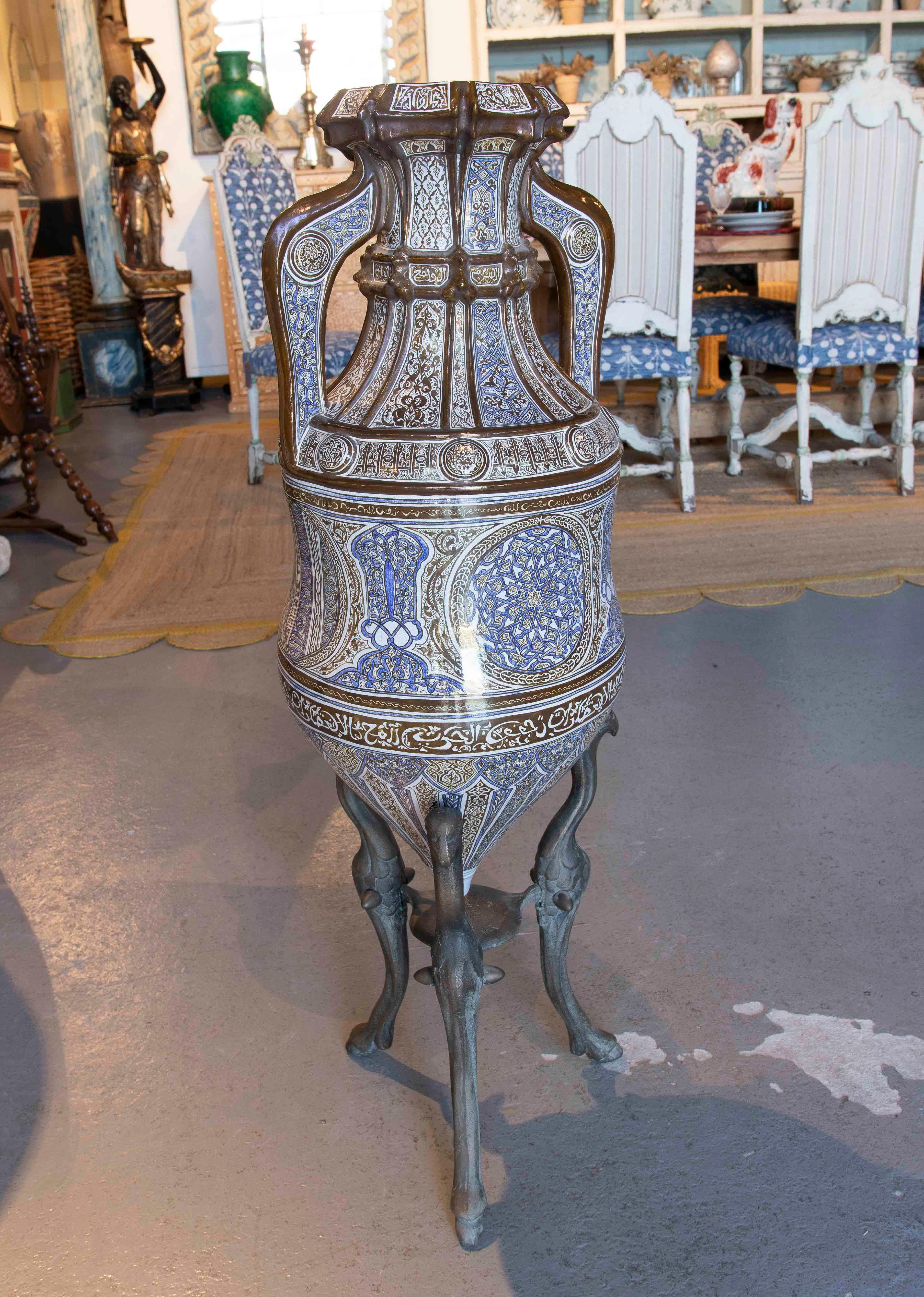 An impressive Arabic glazed ceramic vase, known as the 