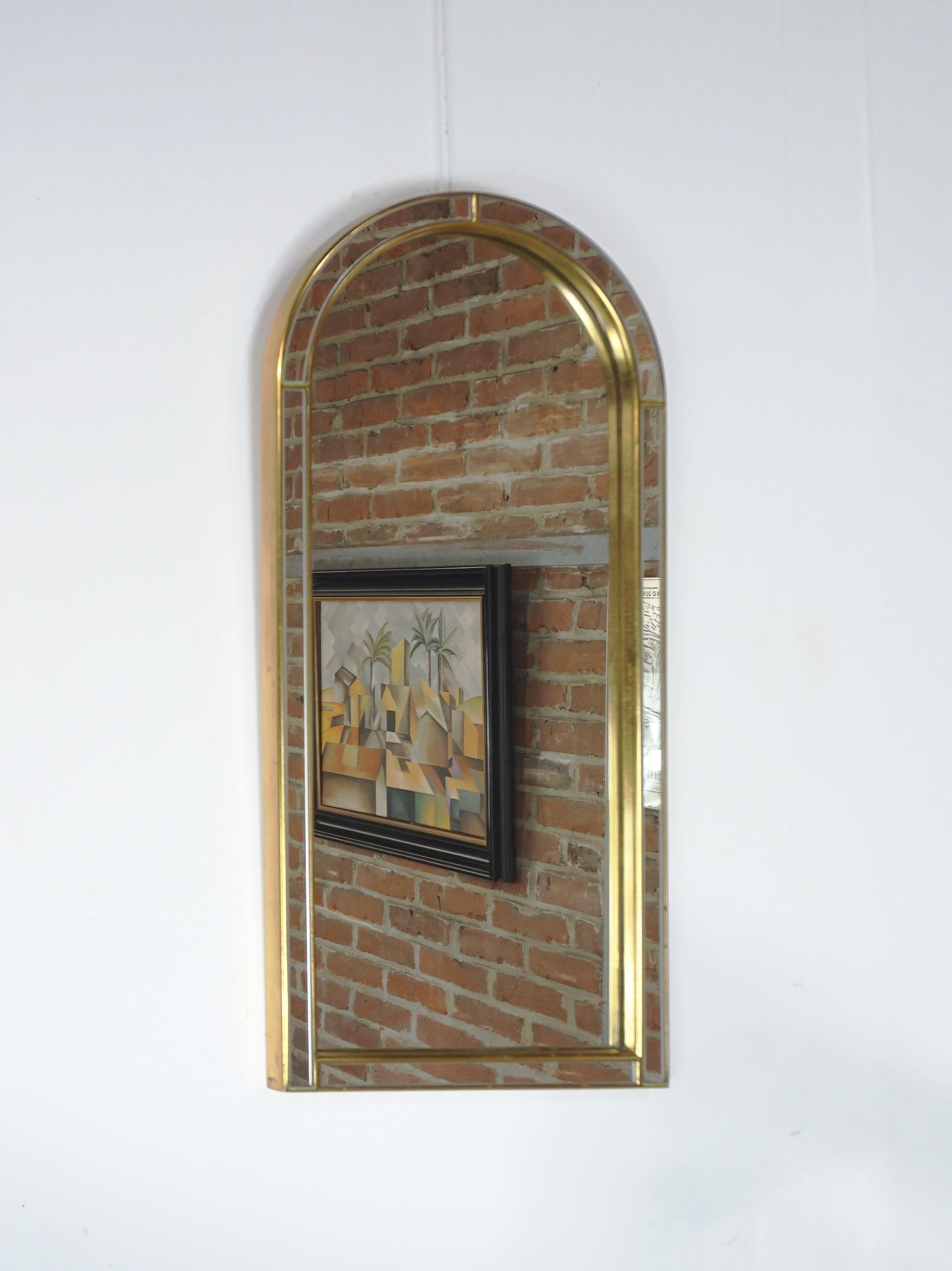 Mirror with parecloses and arcade form high quality that we owe Deknudt home. It imposes by its size but also by the quality of its manufacture and the delicacy of its work. In perfect condition!