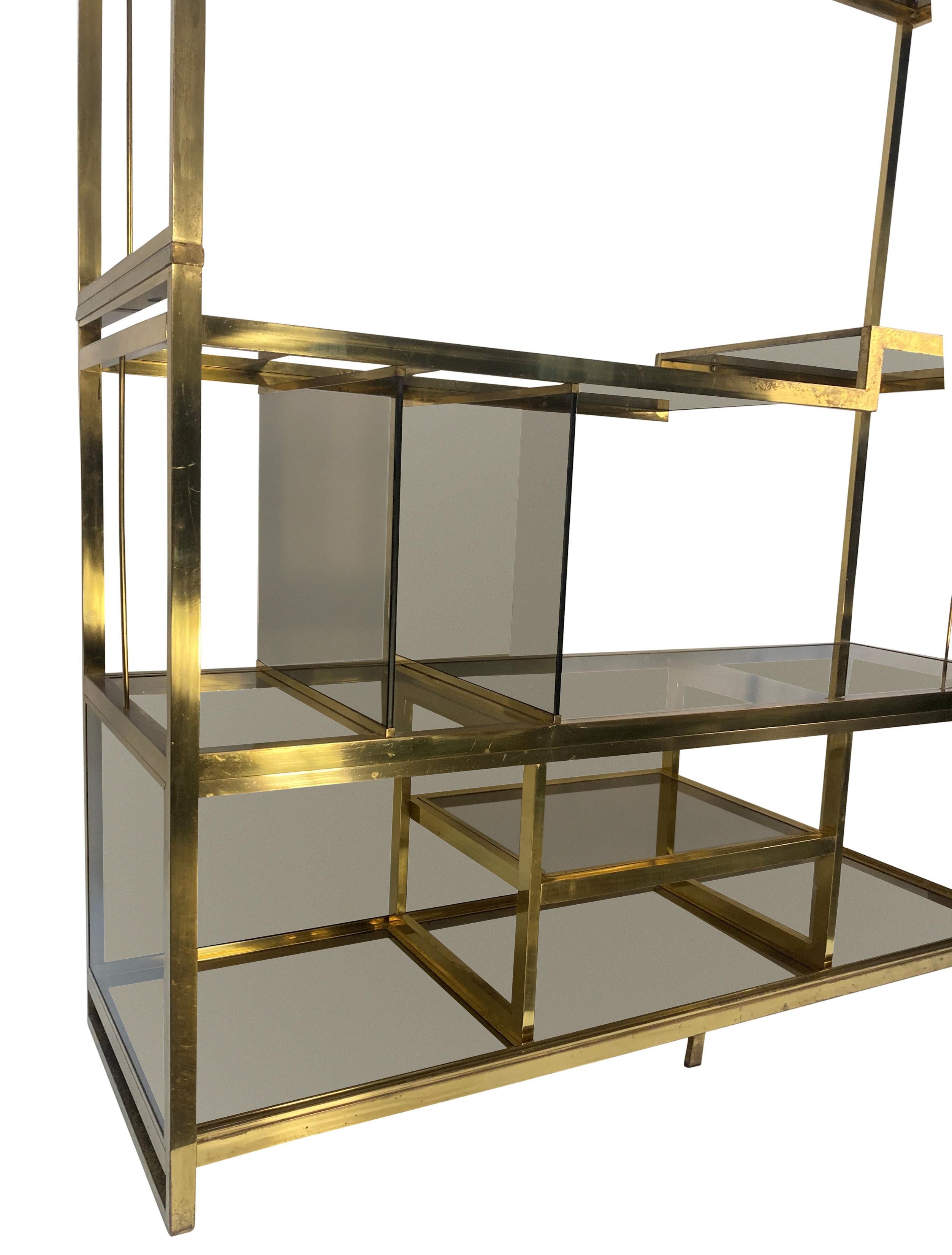 A large Italian brass etagere with smoked glass by Arcangeli & Serantoni for New Ideas Inox. In two sections.