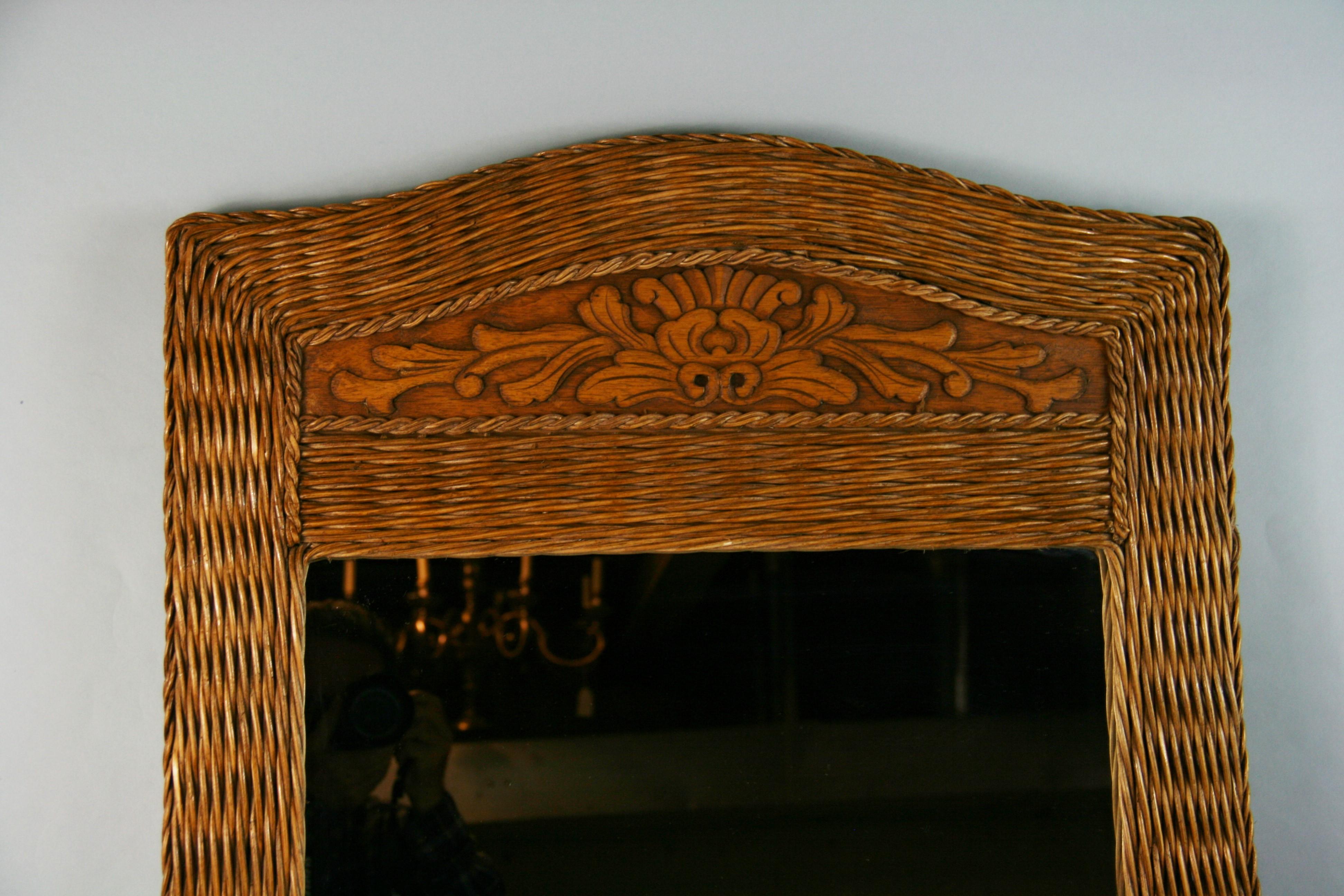 Late 20th Century Large French Arch Top Rattan Mirror with Carved Insert For Sale