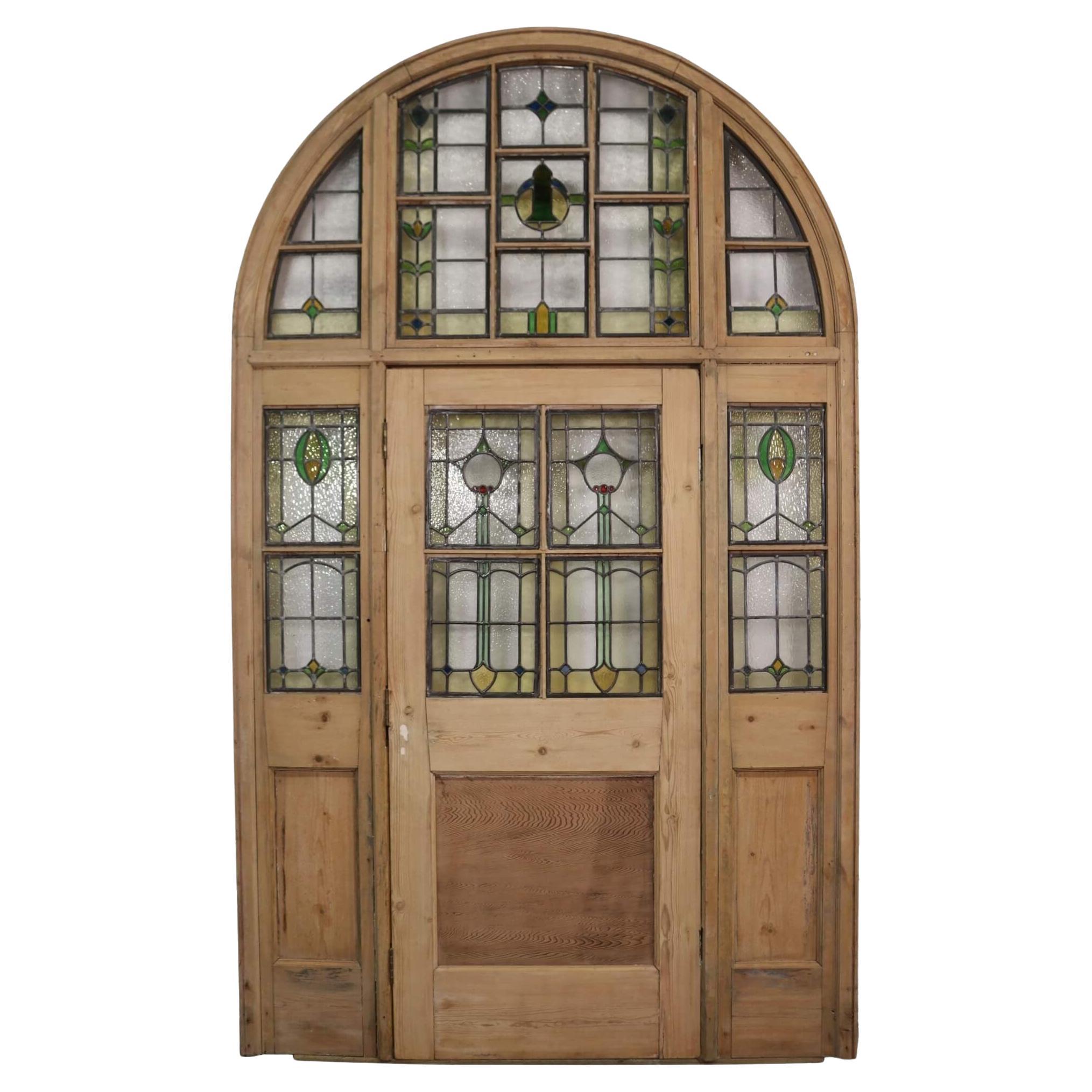 Large Arched Stained Glass Front Door in Frame