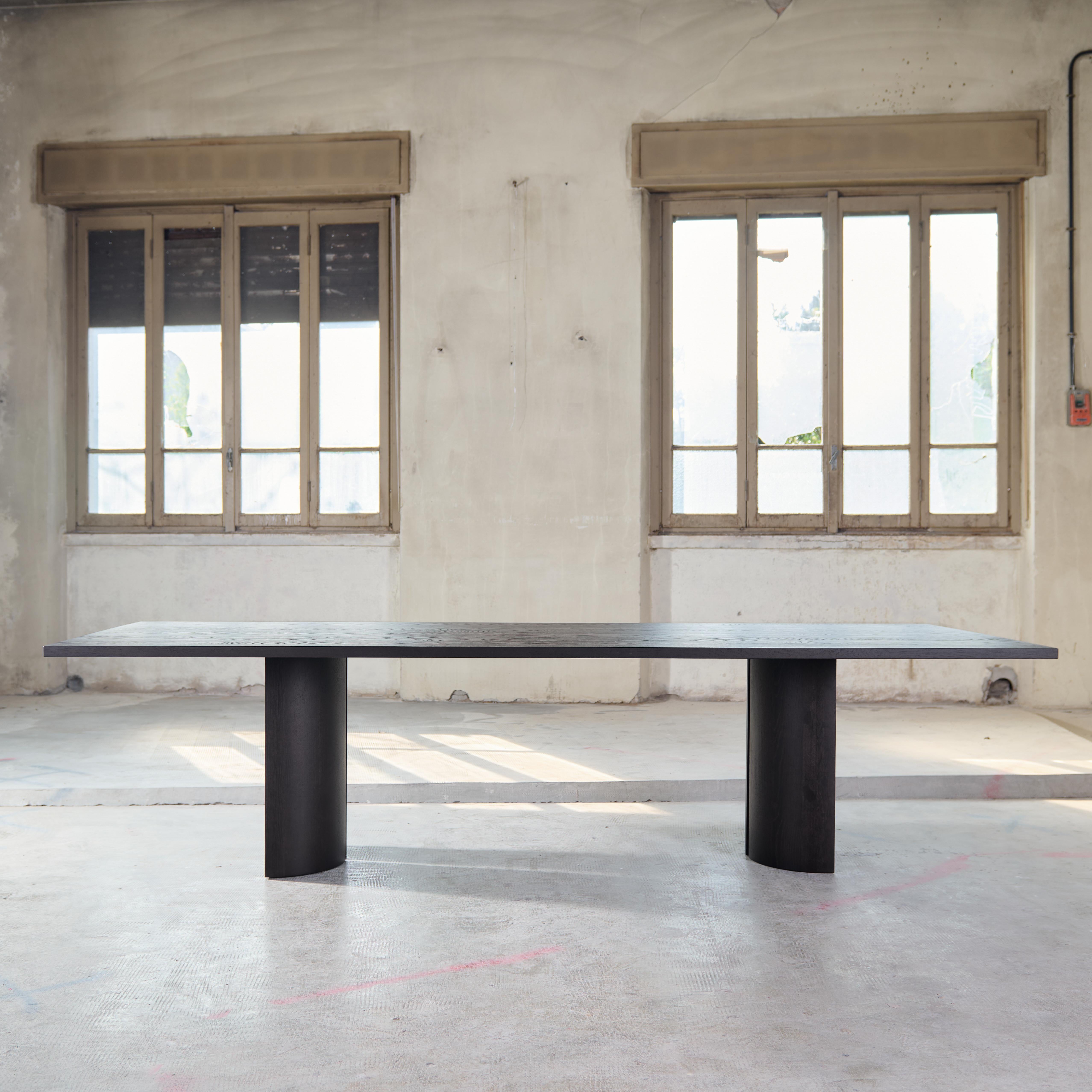 The Aperta table in this listing has the specifications: 
- European oak, color and finish of choice, without brushed surface. 
- Dimensions: 427 x 122 cm 

Aperta is inspired by the mystery and attraction of light and space breaking through narrow