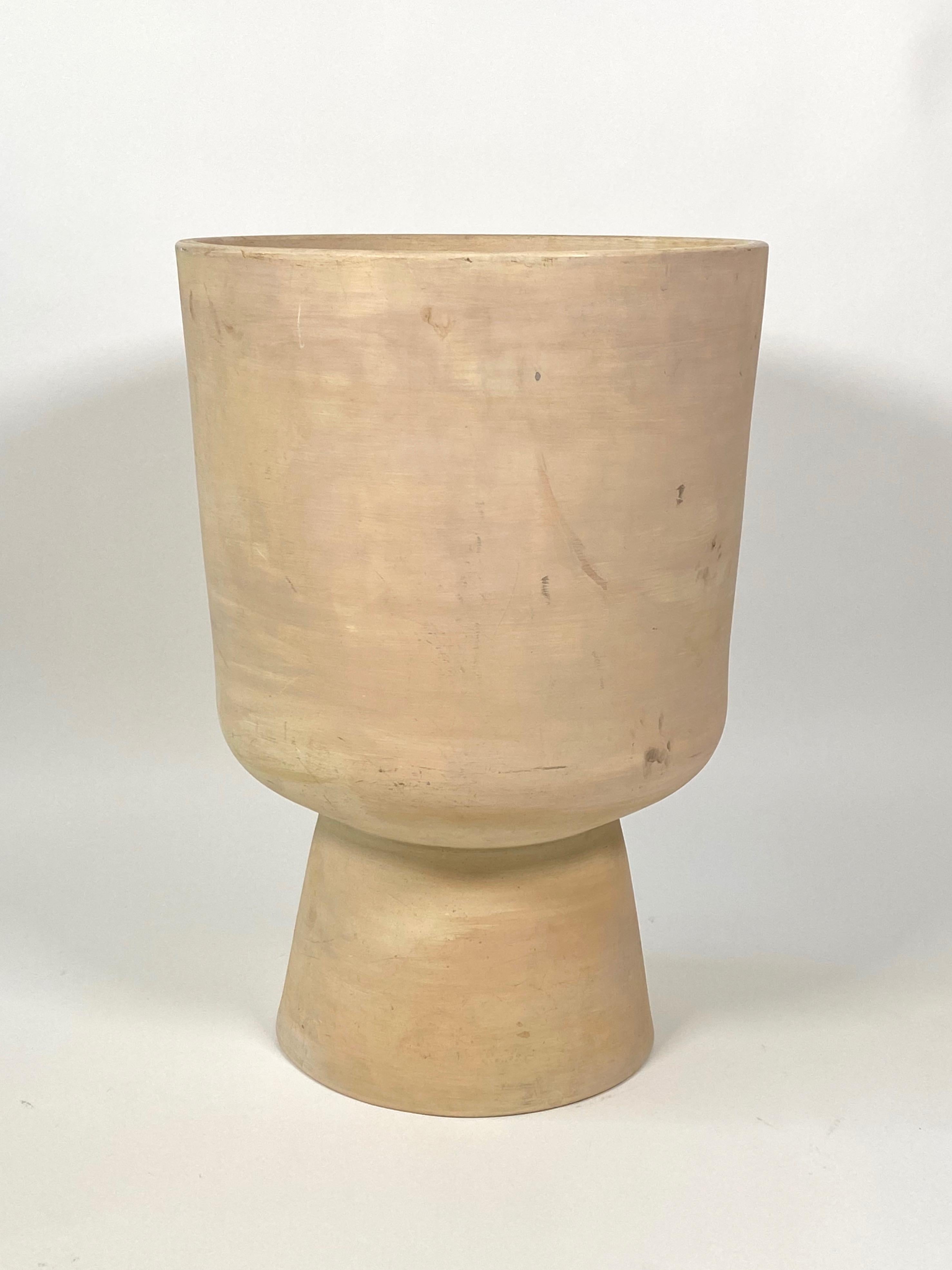 Unglazed planter designed by Malcolm Leland for the Southern California company Architectural Pottery circa 1950s.The bisque finish was designed to let the water evaporate when the planter was used indoors. The largest of this design sometimes
