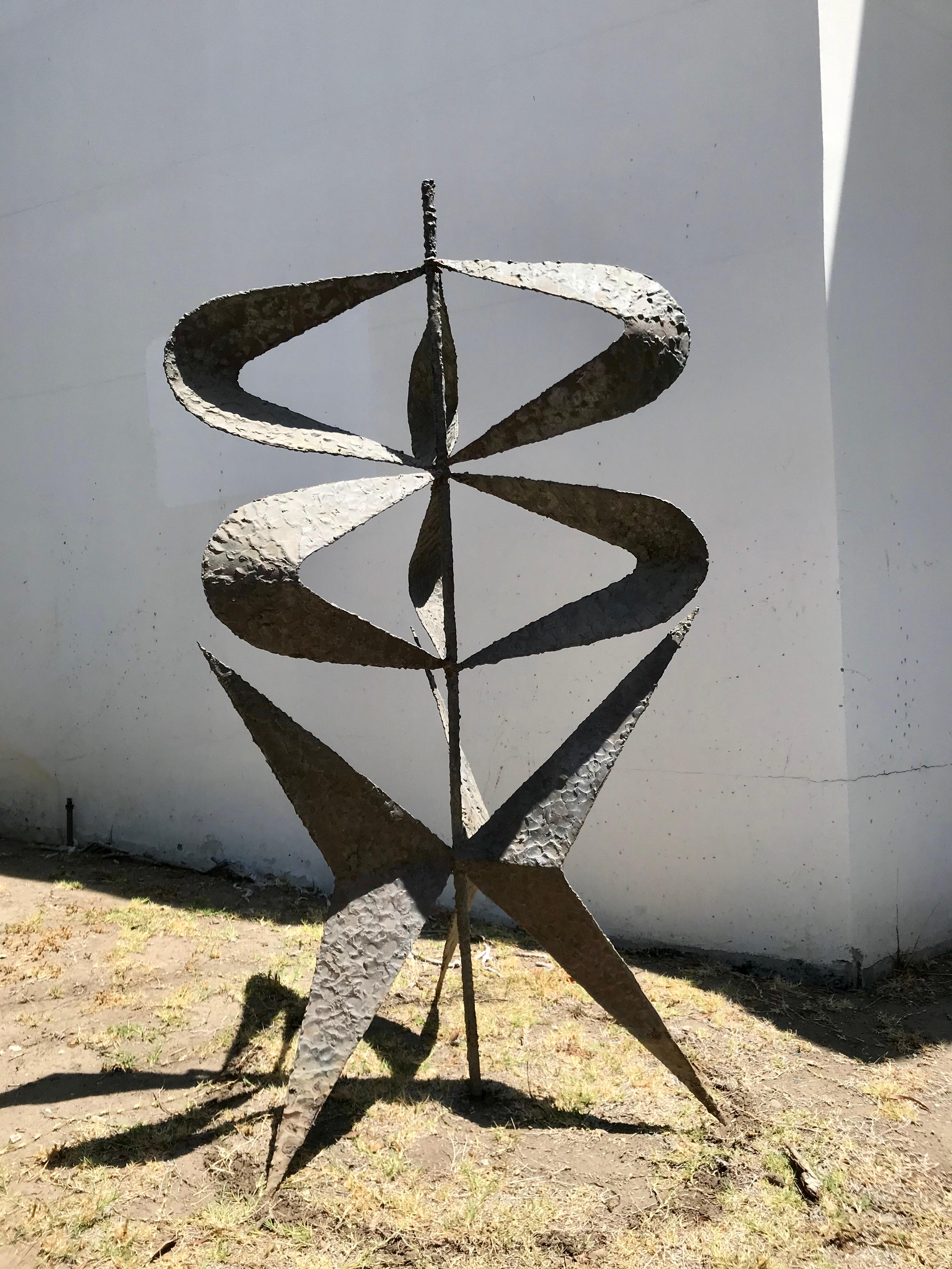 This great piece of modern art appears to be a site specific piece.
It was salvaged from a mid century modern post & beam house in Beverly Hills designed by Buff, Straub & Hensman.
welded steel with brutalist molten bronze beading and verdigris