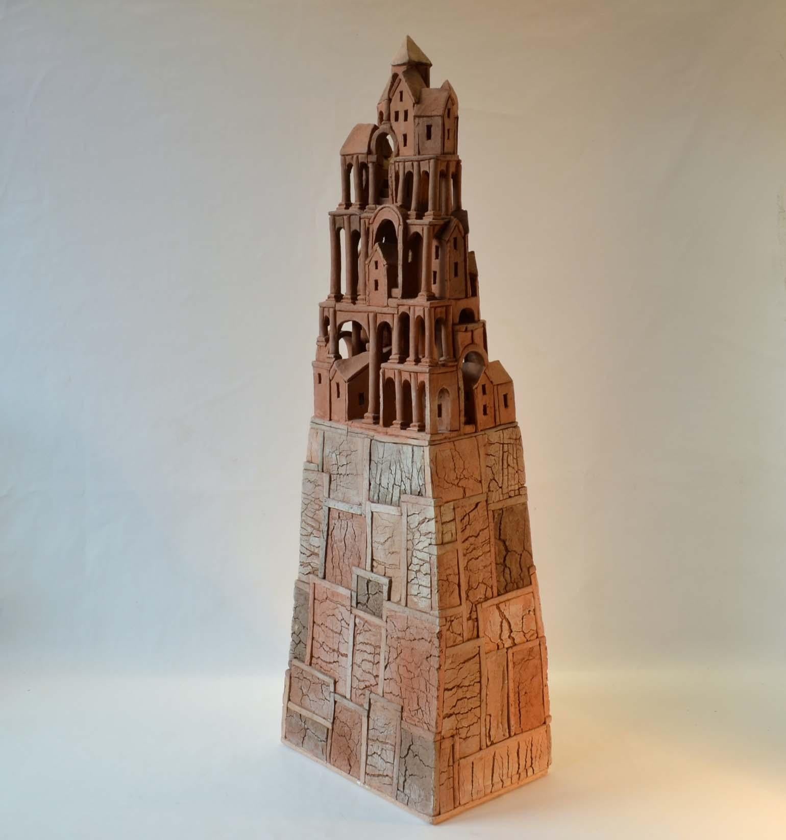 Tower build in red baking clay by Dutch artist Arie Bouter, Gouda 1995 (B. 1942) is based on medieval European architecture and has a strong resemblance with Mont St. Michel in France, the Tower of Babel but also refer to M. C. Escher's drawing